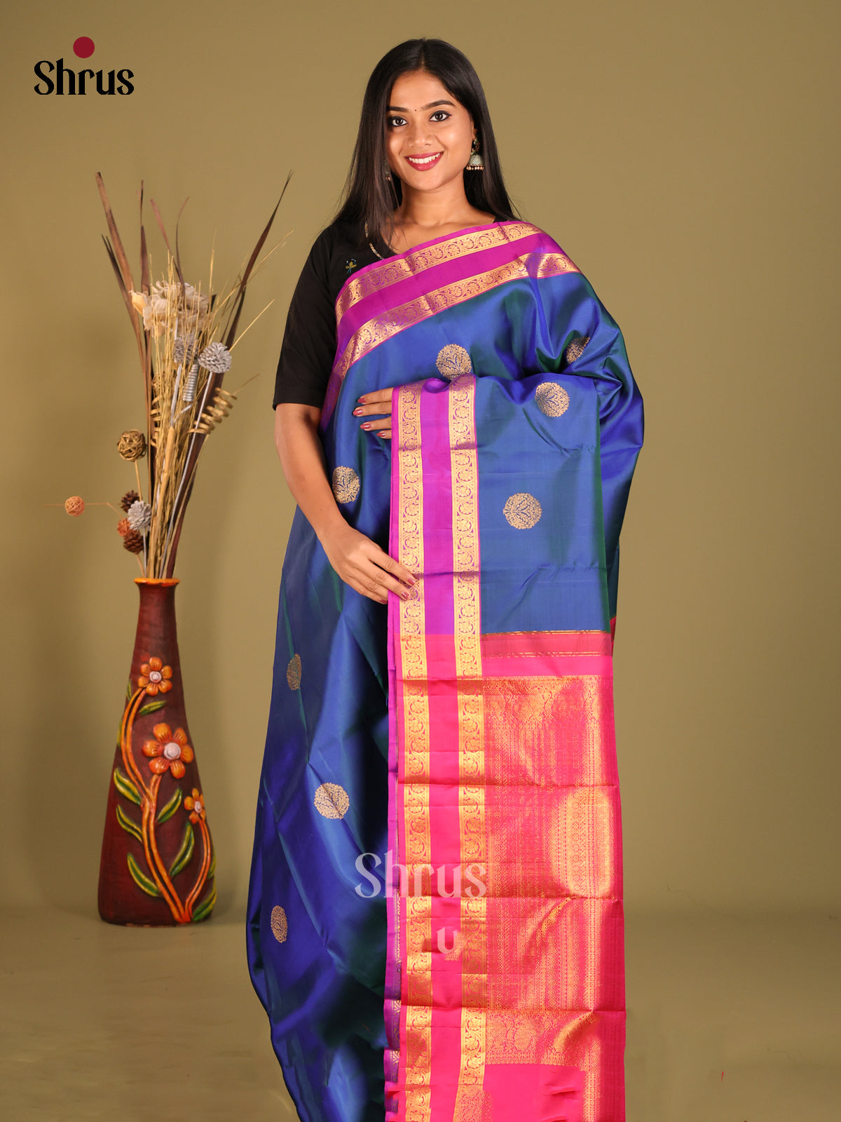 Classy Blue Kanchipuram silk Saree with Pink rettaipet zari border