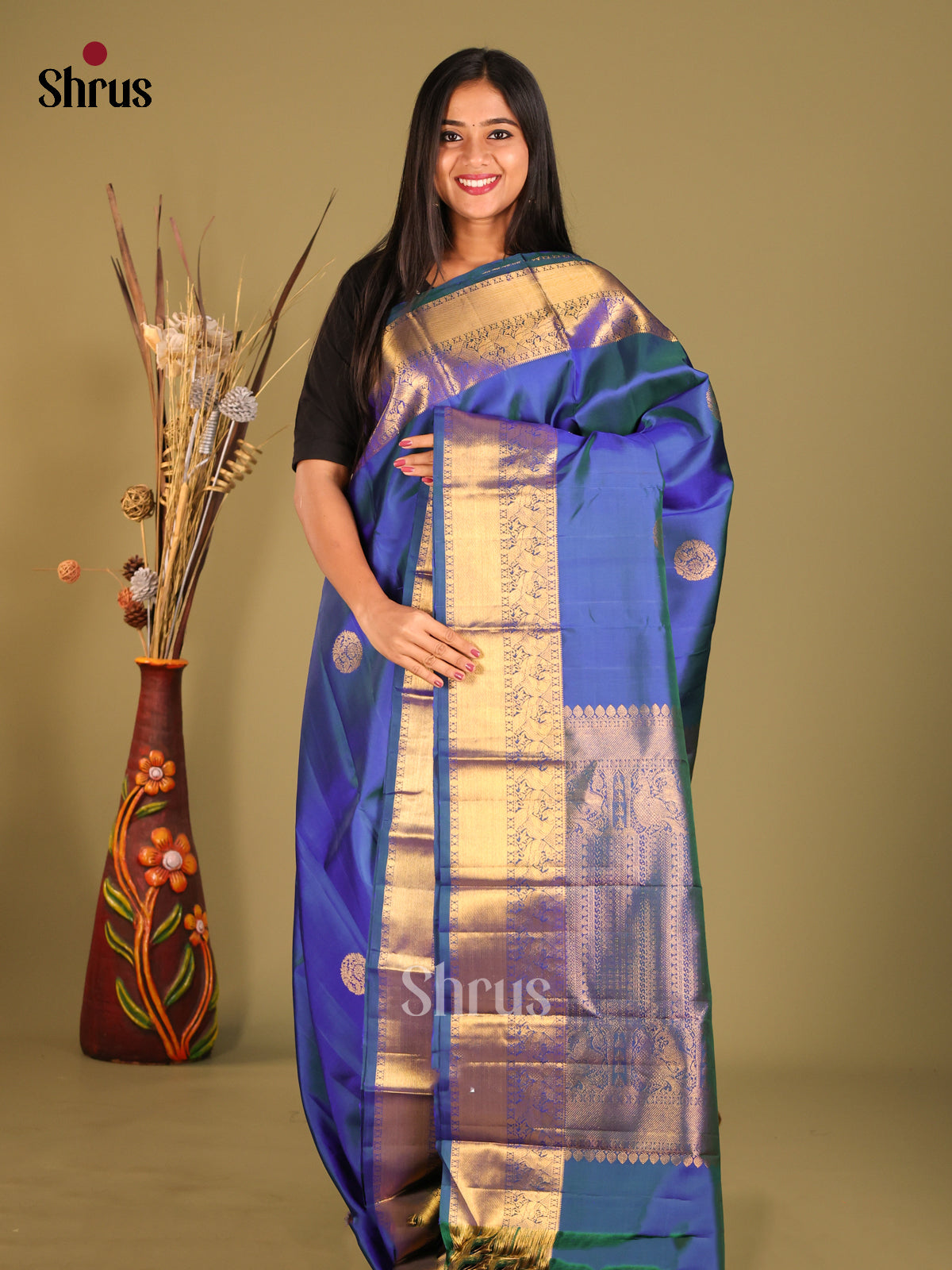 Vivid Blue Kanchipuram Saree with golden floral motifs & Brocade Pallu