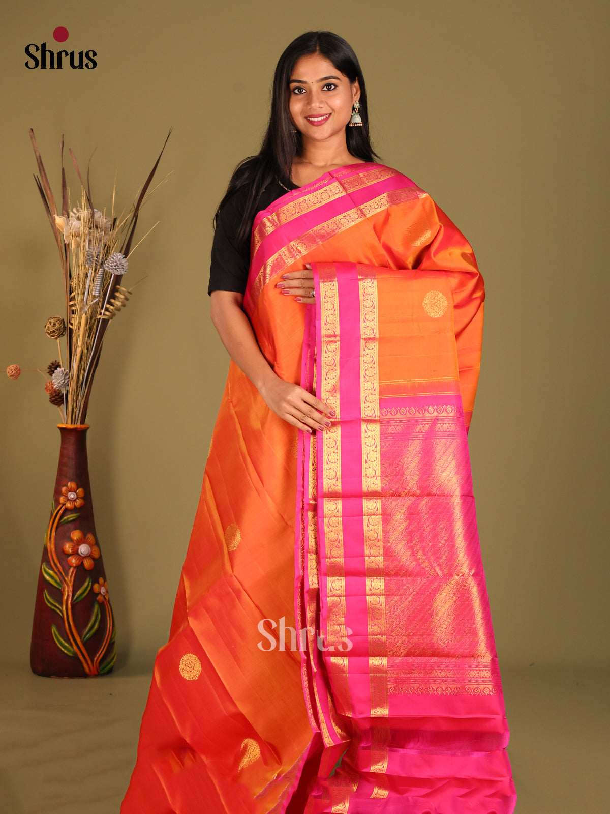 Radiant Orange Kanjivaram Silk Saree with Zari Buttas & Pink rettaipet border