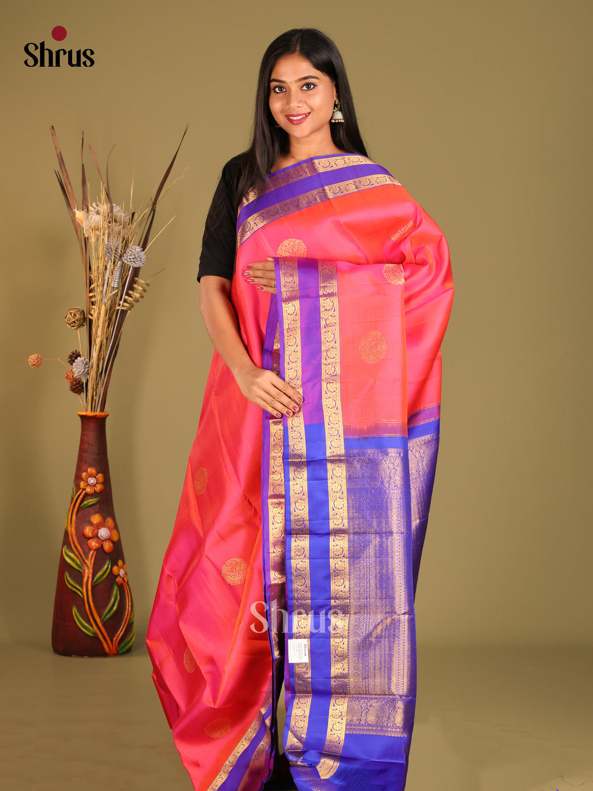 Exquisite Orangish Pink Kanchipuram Silk Saree with Floral Motifs & Rettaipet border