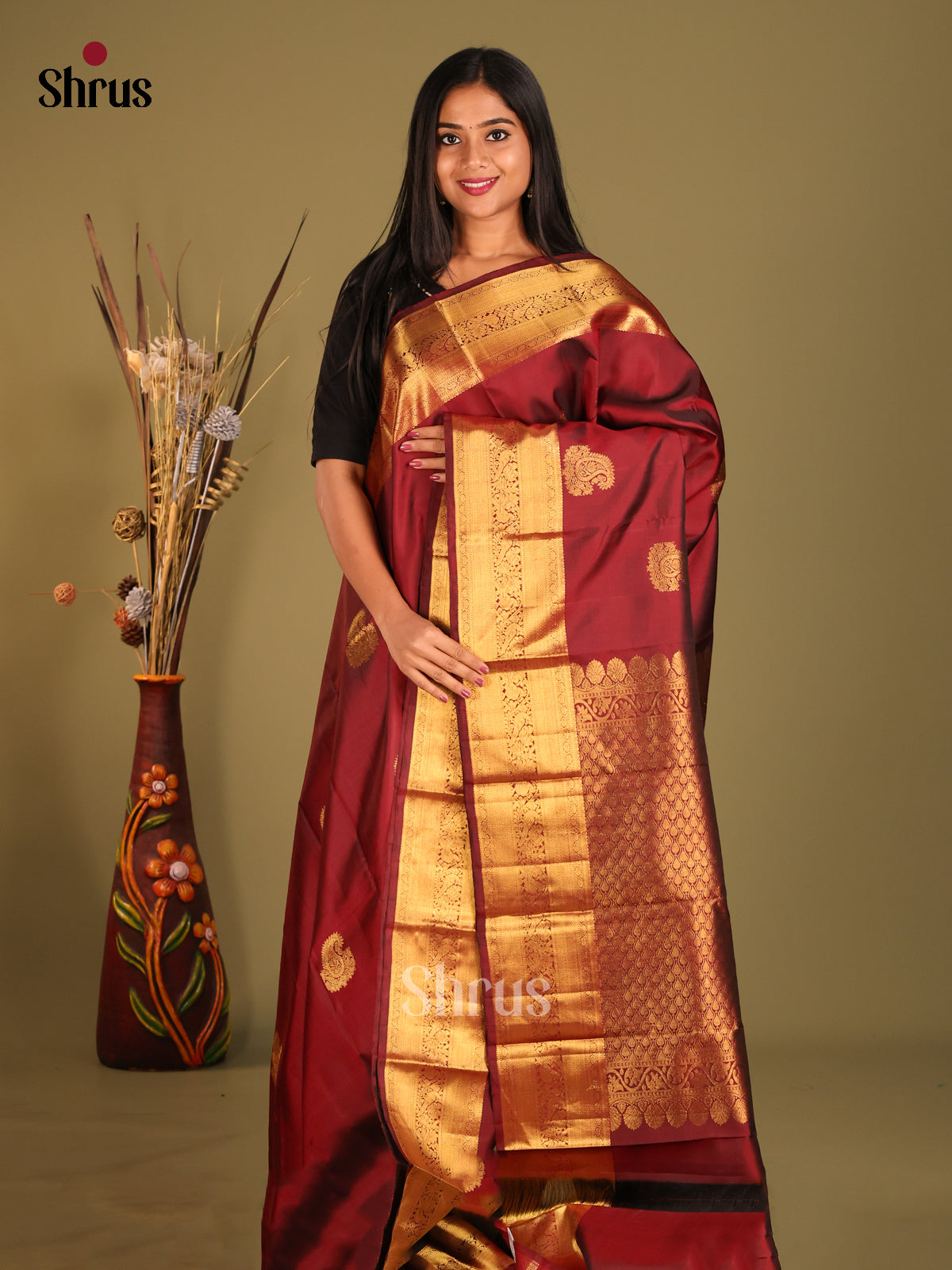 Classic Maroon Kanchipuram Silk Saree with paisleys motifs & Rich Zari Woven Border