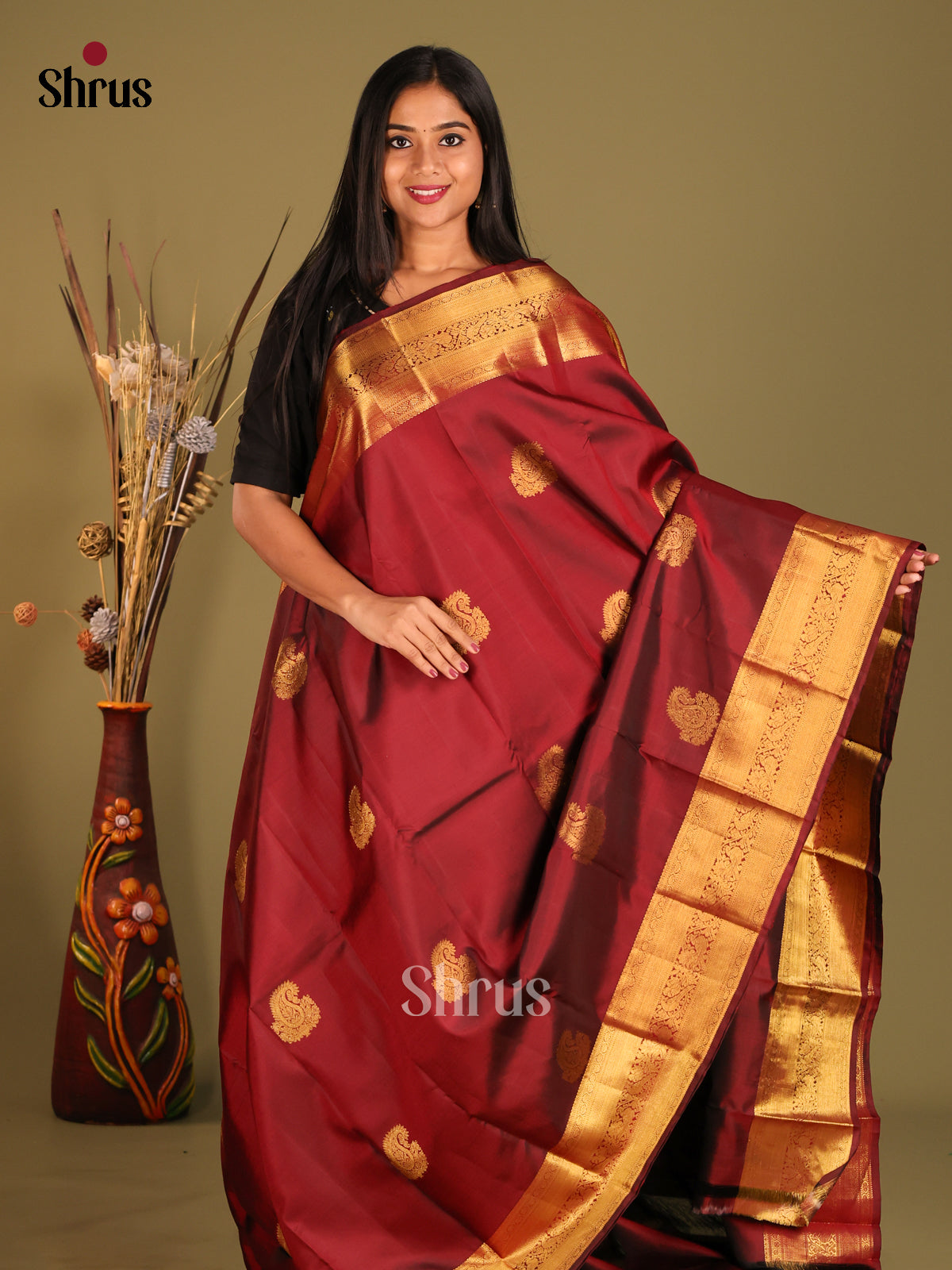 Classic Maroon Kanchipuram Silk Saree with paisleys motifs & Rich Zari Woven Border
