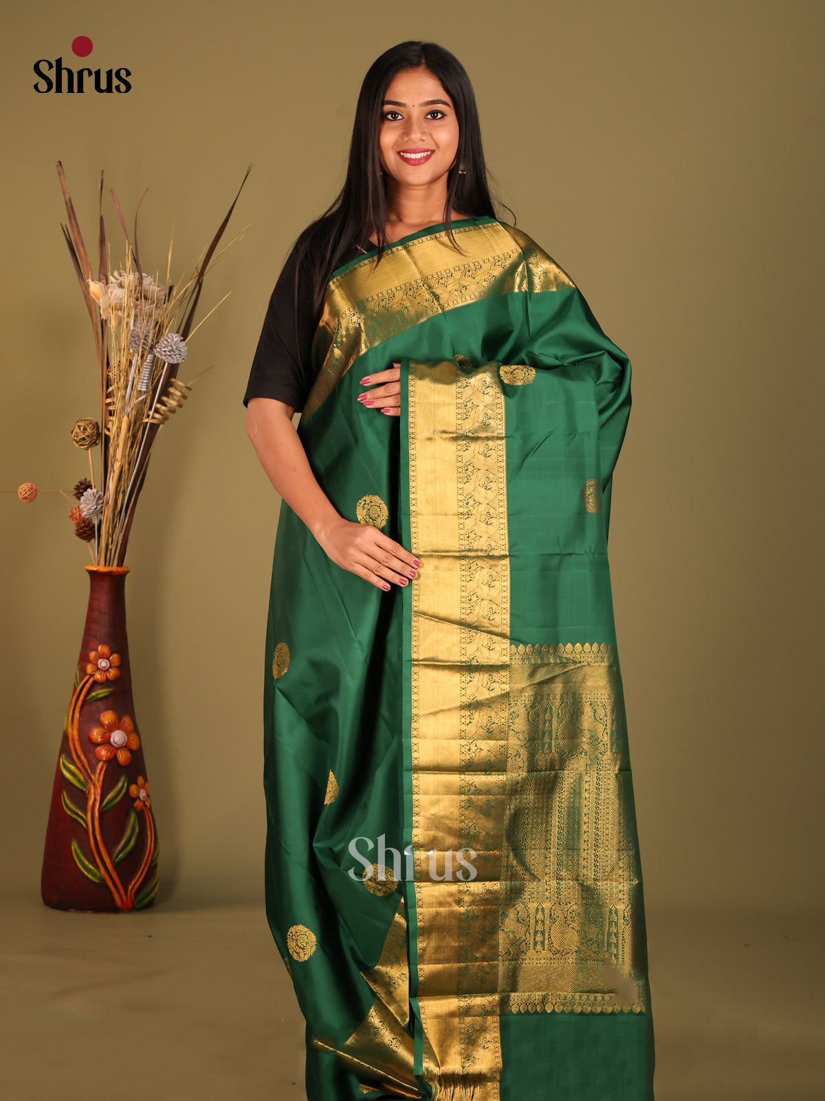 Timeless Green Kanchipuram Silk Saree with zari Woven Rudraksh motifs & Brocade Pallu