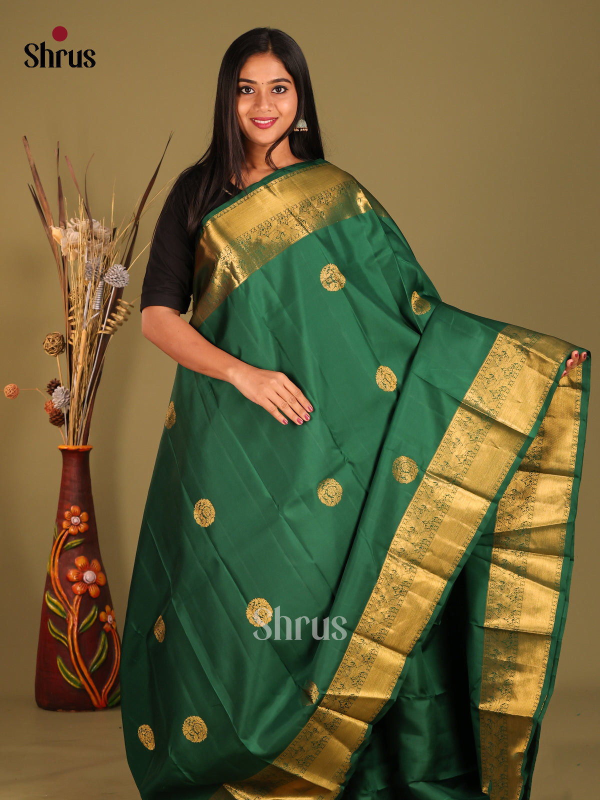 Timeless Green Kanchipuram Silk Saree with zari Woven Rudraksh motifs & Brocade Pallu