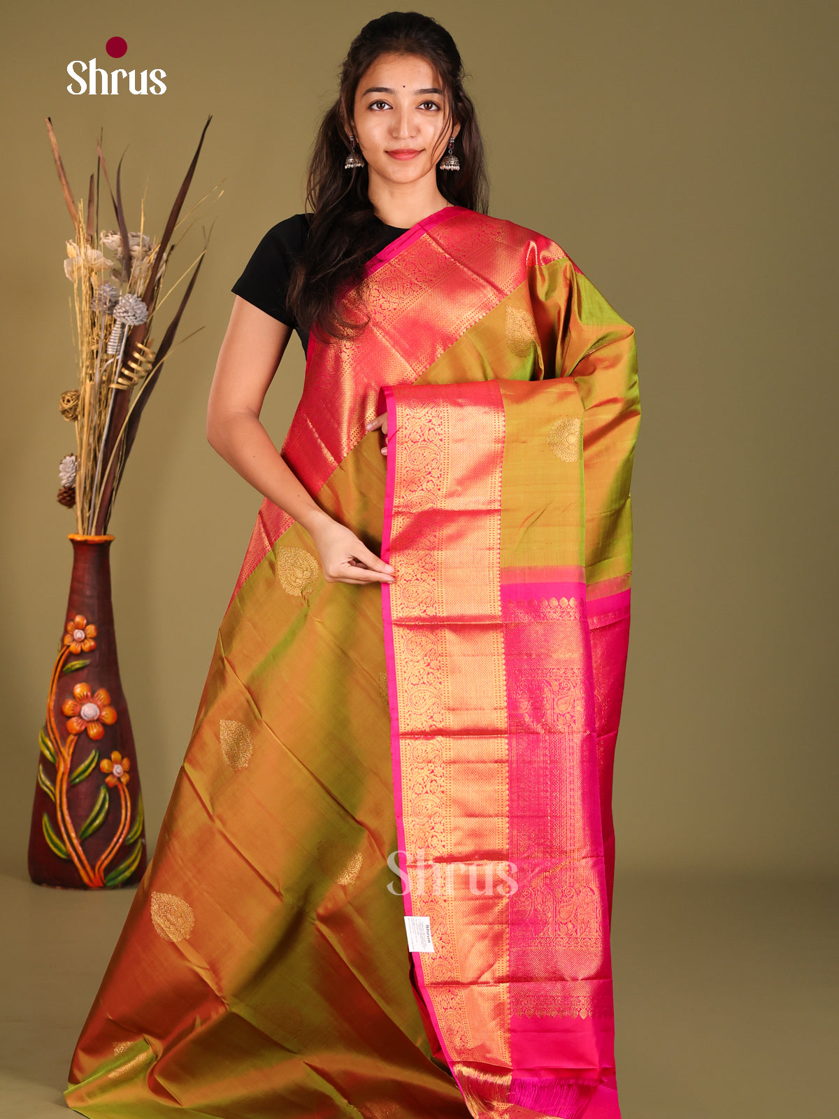 Double Shaded Green & Pink Kanchipuram Butta design Saree gleams with gold zari drop motifs - Shop on Shrus.com