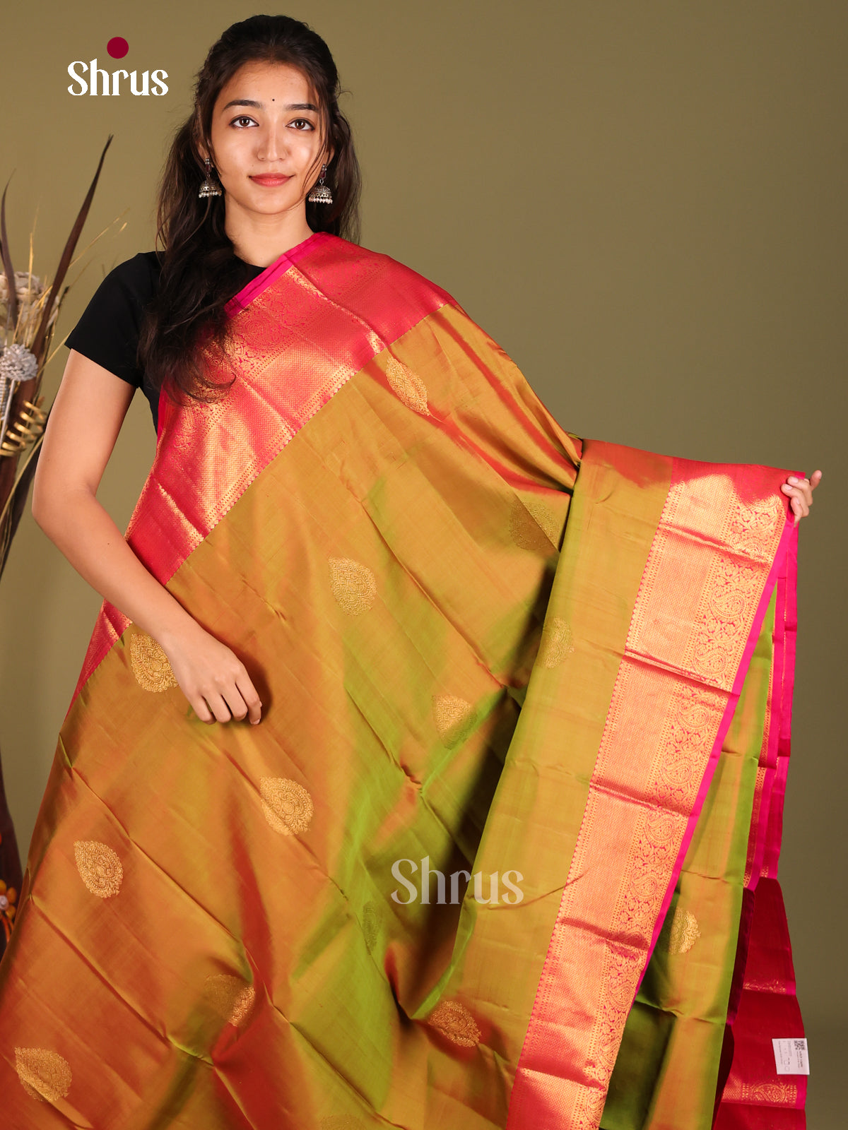 Double Shaded Green & Pink Kanchipuram Butta design Saree gleams with gold zari drop motifs - Shop on Shrus.com