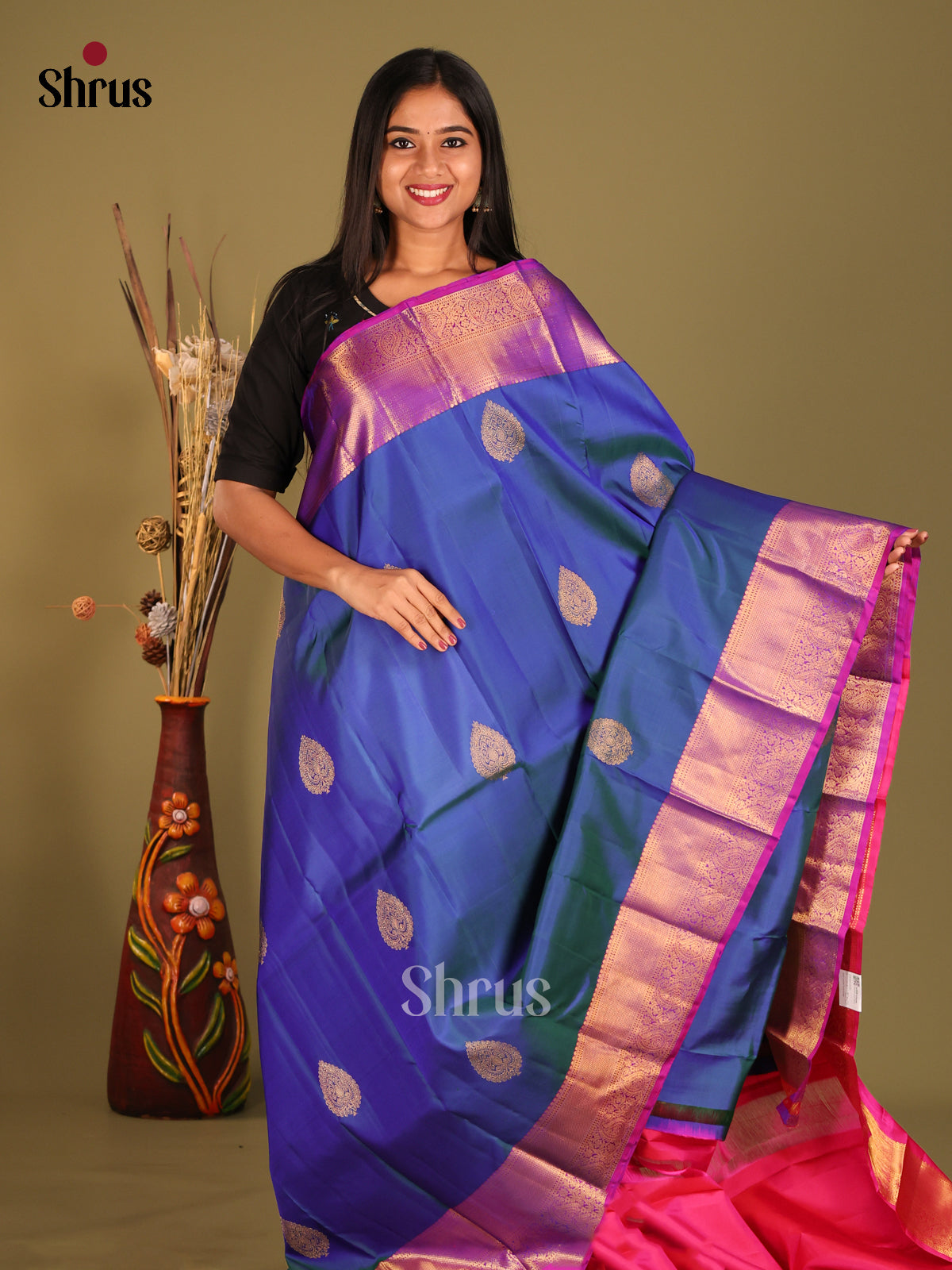 Blue & Pink Kanchipuram Butta design Saree Gleams with zari drop motifs