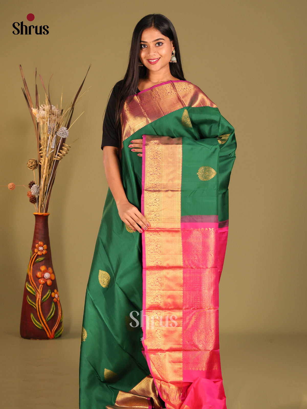 Stunning Green Kanjivaram Silk Saree with Golden Floral Motifs & rich Pink zari border