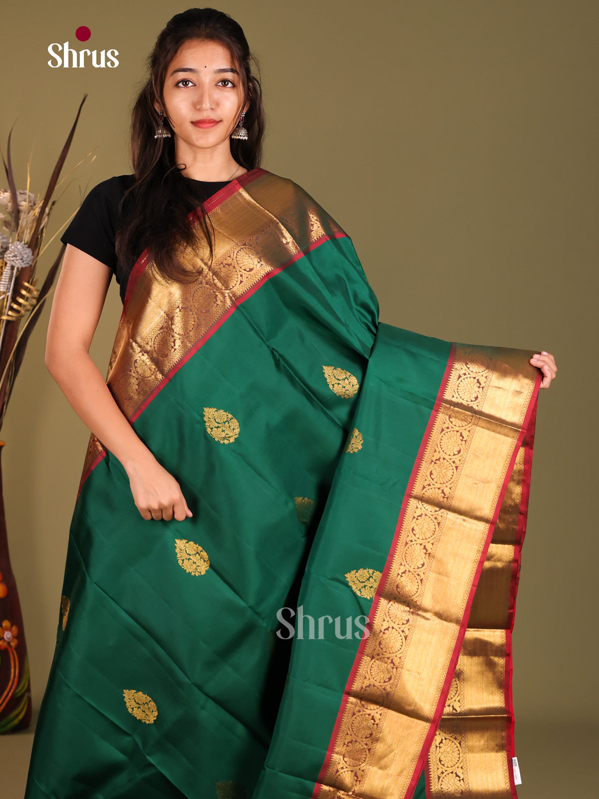 Opulent Green Kanchipuram Silk Saree with Golden thilagam motifs & Red Zari Border 1