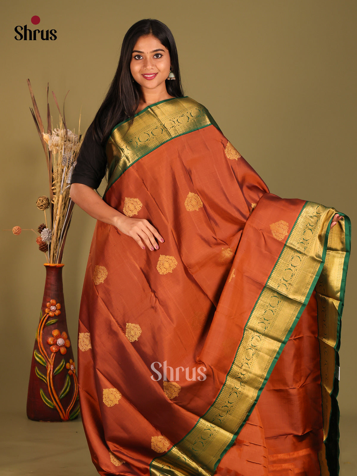 Classy Korvai Rust Kanchipuram Silk Saree with floral buttas & green Brocade Pallu 1