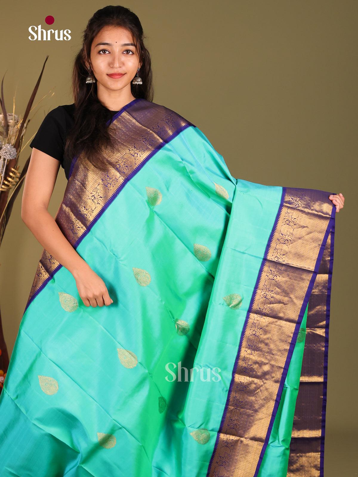 Pastel Blue Kanjivaram Saree with Golden thilagam motifs & Blue Zari Woven Border -1