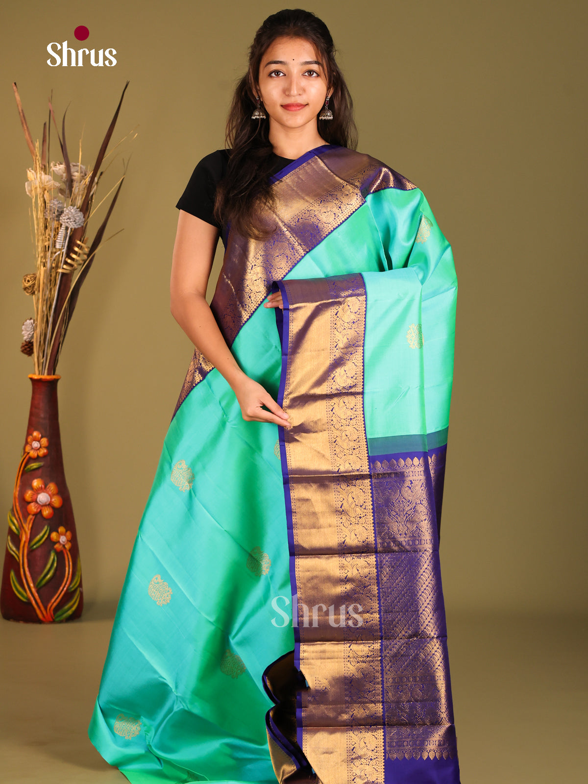 Pastel Blue Kanjivaram Silk Saree with paisley motifs & Contrast Blue Zari Border