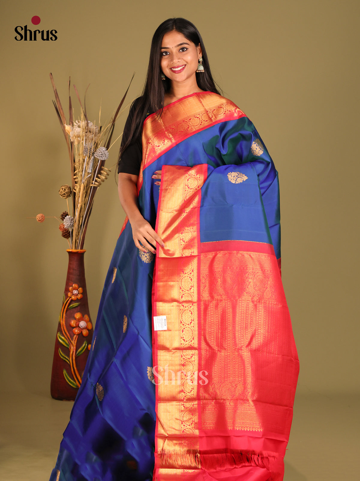 Vibrant Blue Kanchipuram Saree with thilagam motifs & Red Brocade Pallu