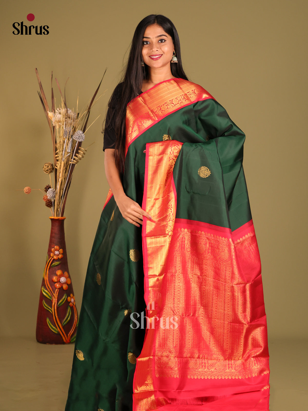 Elegant Green Kanjivaram Silk Saree with floral buttas & Rich Red Zari Border