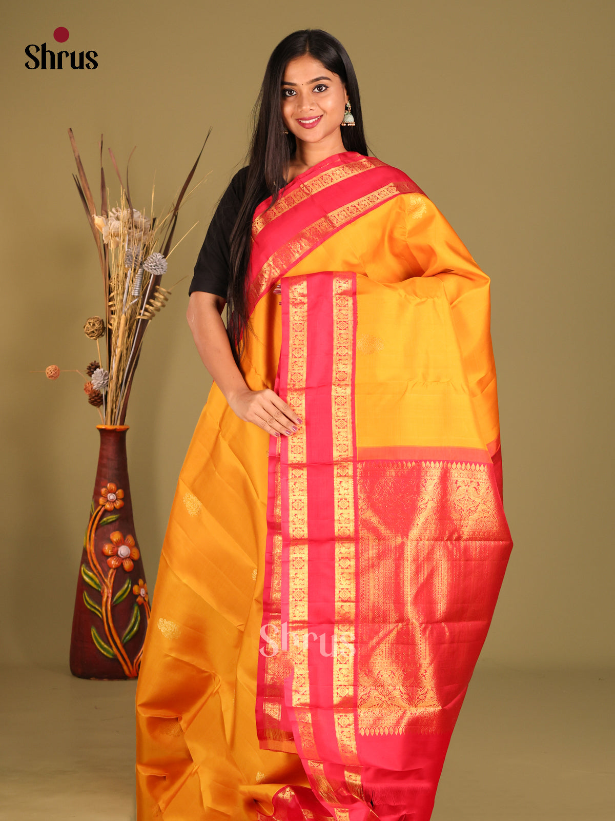Chic Mambazha Yellow Kanchipuram Silk Saree with Zari Buttas & Red Rettaipet zari border
