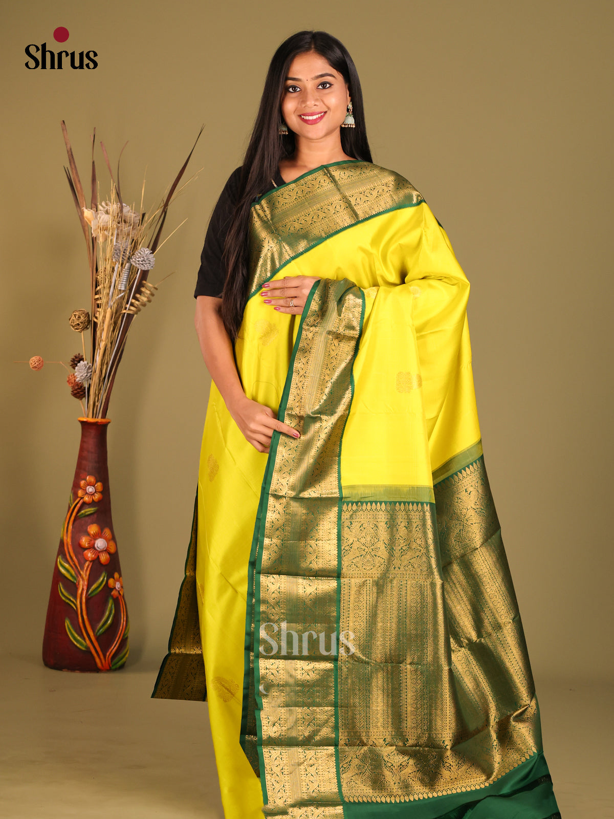 Glorious Yellow Kanchipuram Silk Saree with Zari Motifs & rich Green zari border