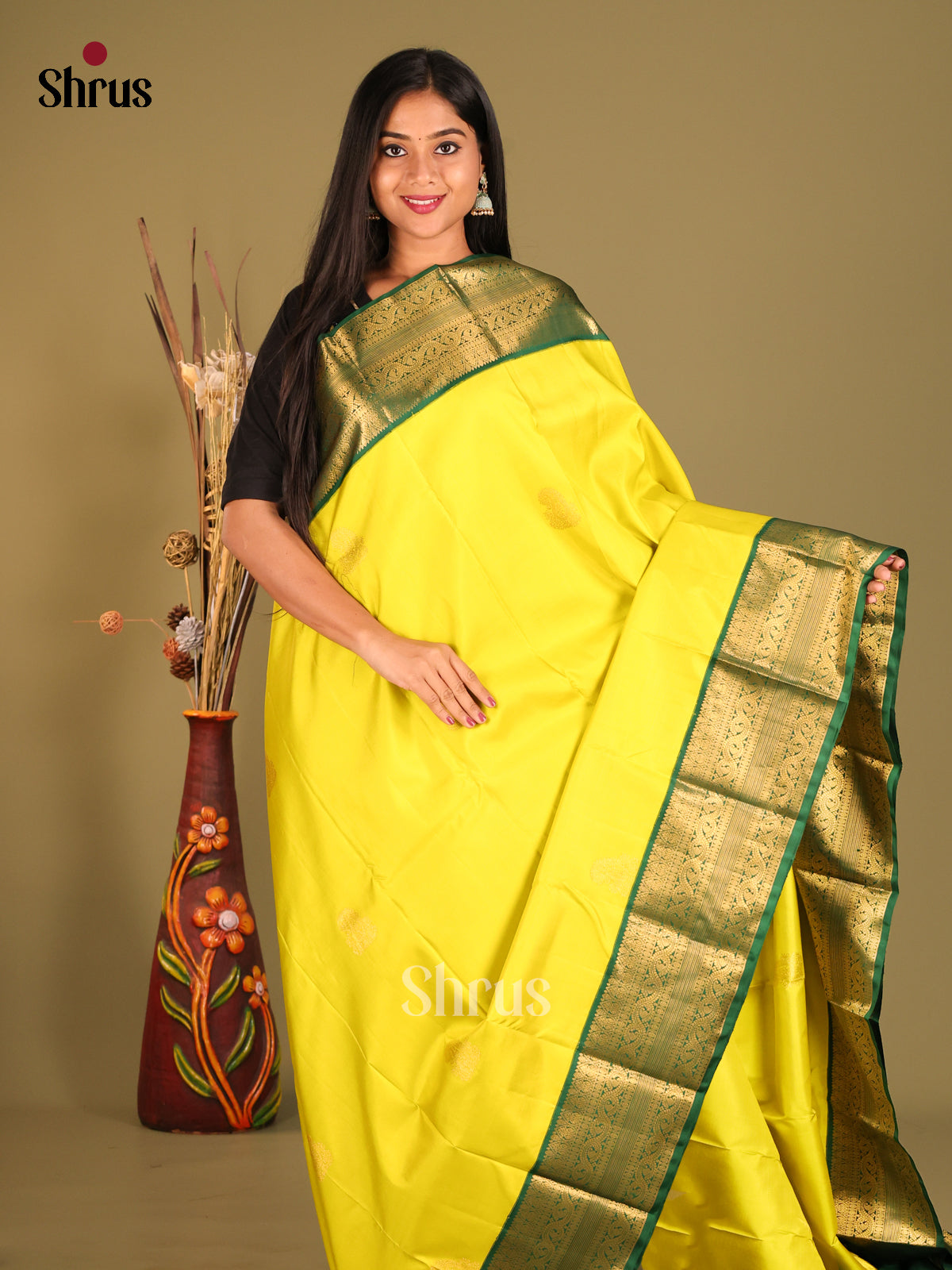 Glorious Yellow Kanchipuram Silk Saree with Zari Motifs & rich Green zari border