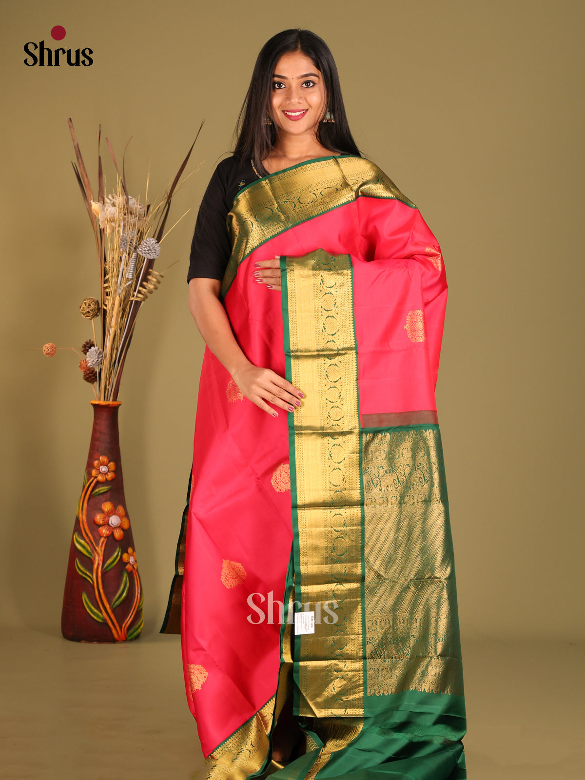 Timeless Pink Kanchipuram Saree with floral motifs & Green Zari Border