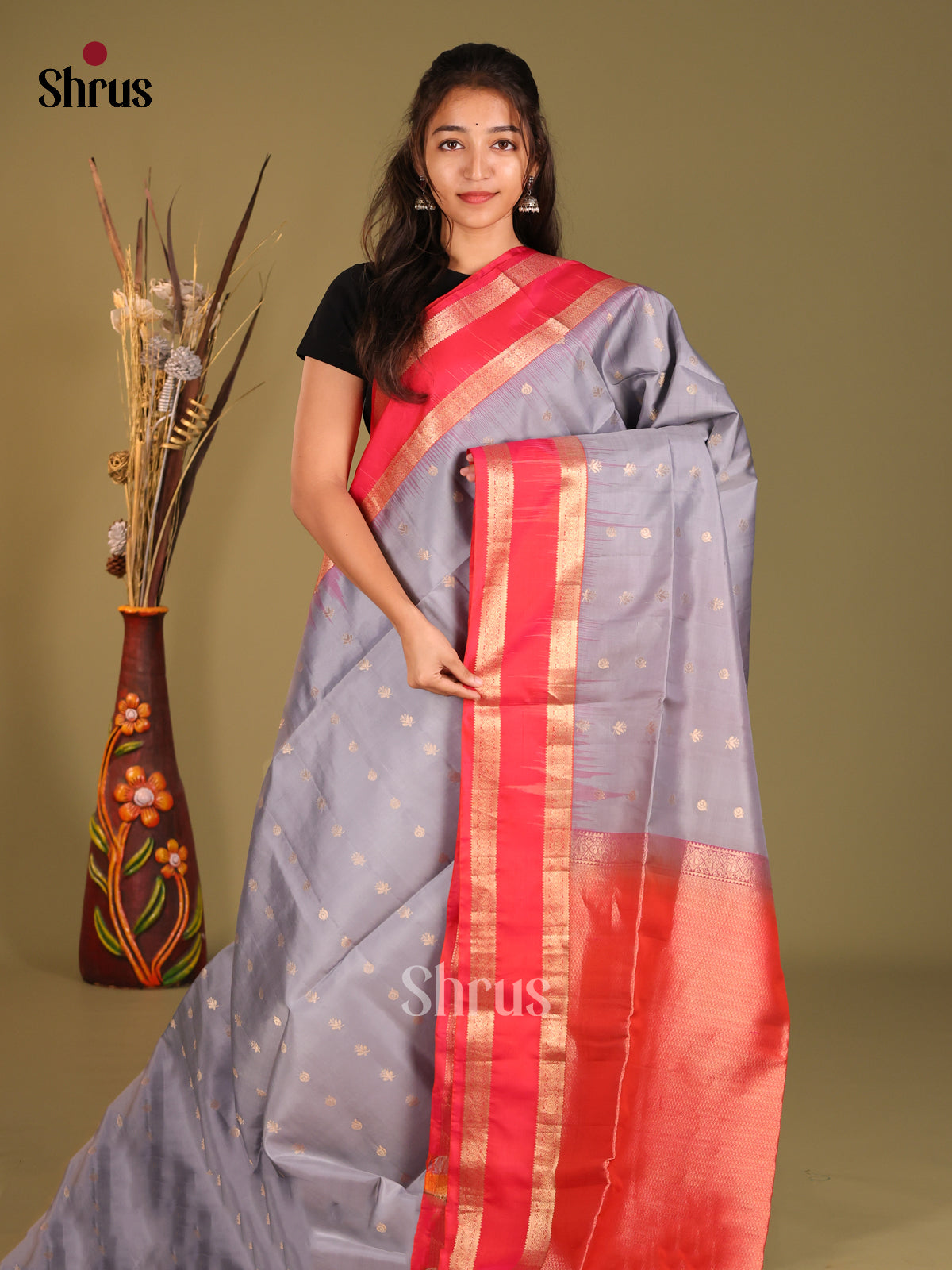Luxurious Grey Soft Silk Saree with small golden buttas & Orangish Pink rettaipet zari border