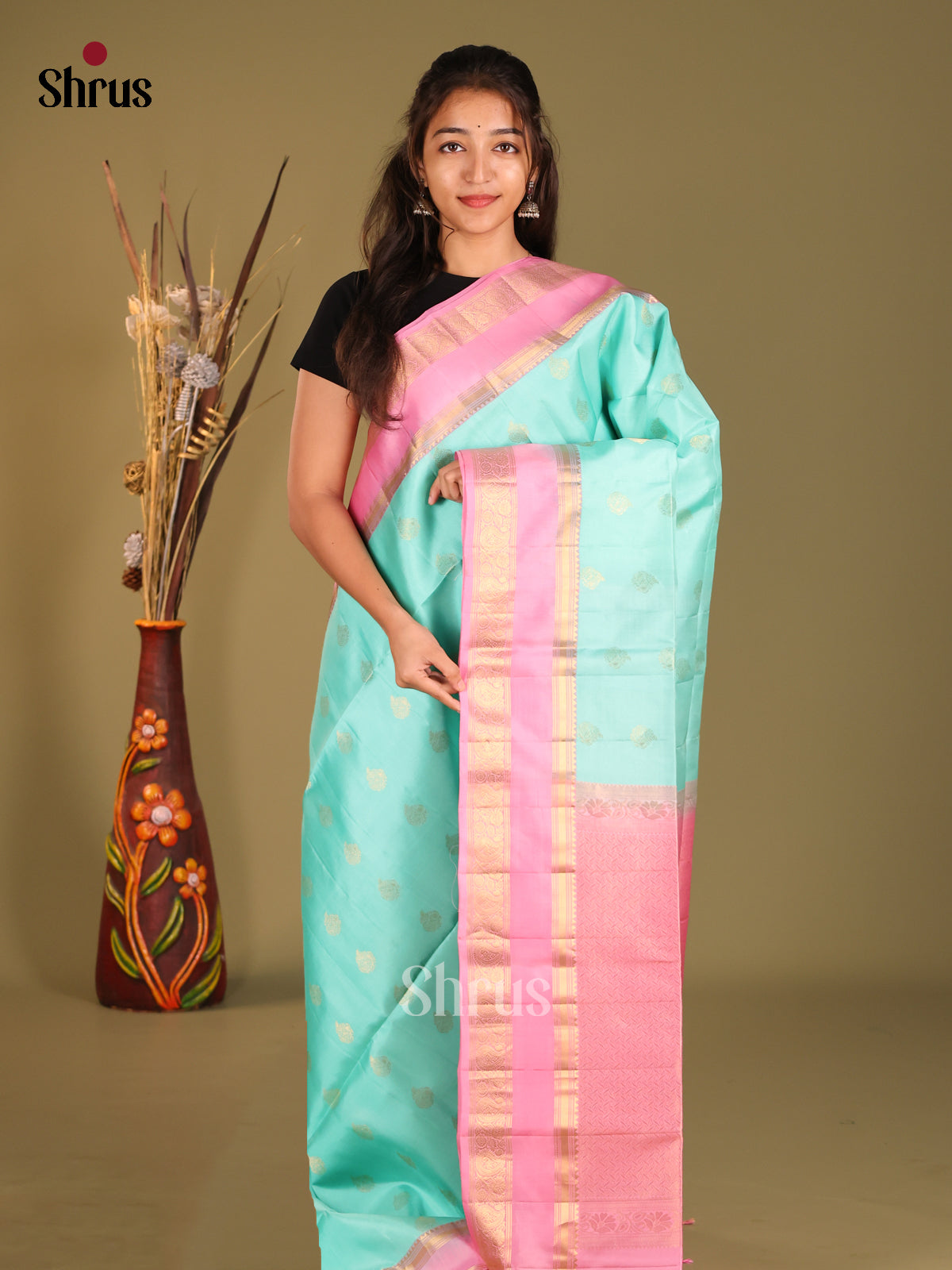 Delicate Teal Green Soft Silk Saree with Golden Motifs & Pink rettaipet zari border