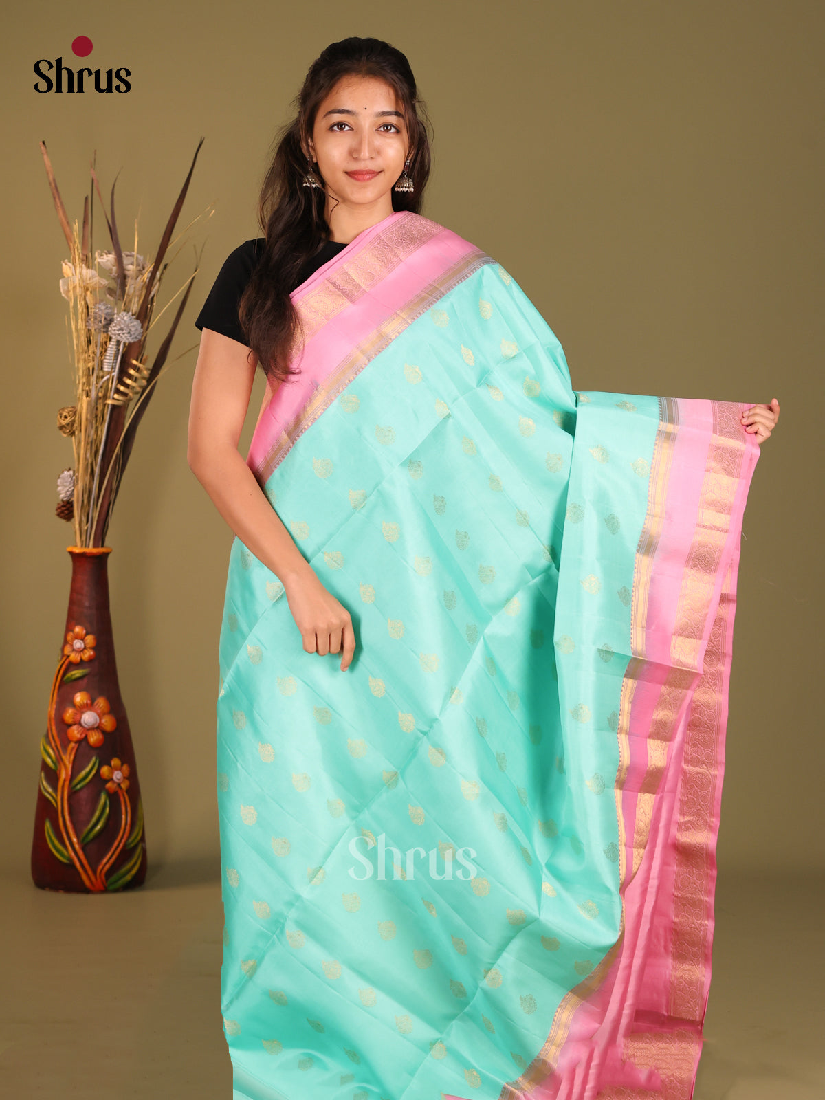 Delicate Teal Green Soft Silk Saree with Golden Motifs & Pink rettaipet zari border -1