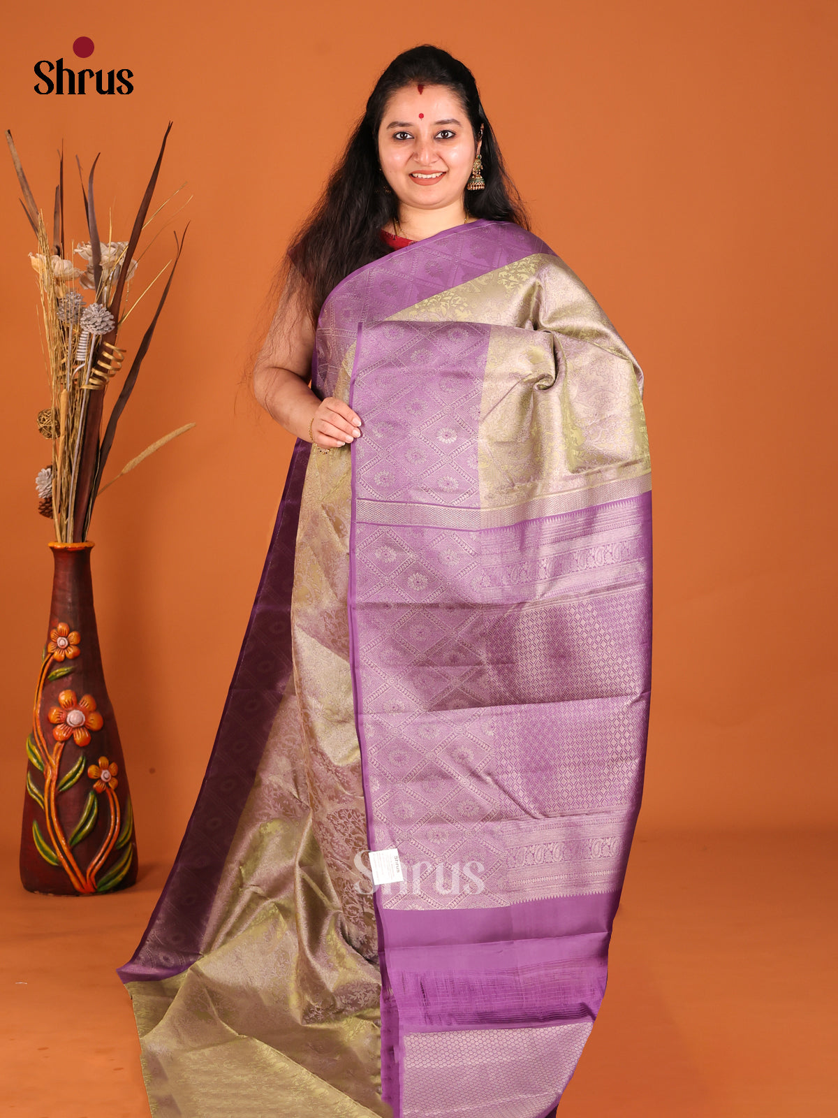 Unique Double Shaded Green Kanjivaram saree with Floral Brocade & Purple Border