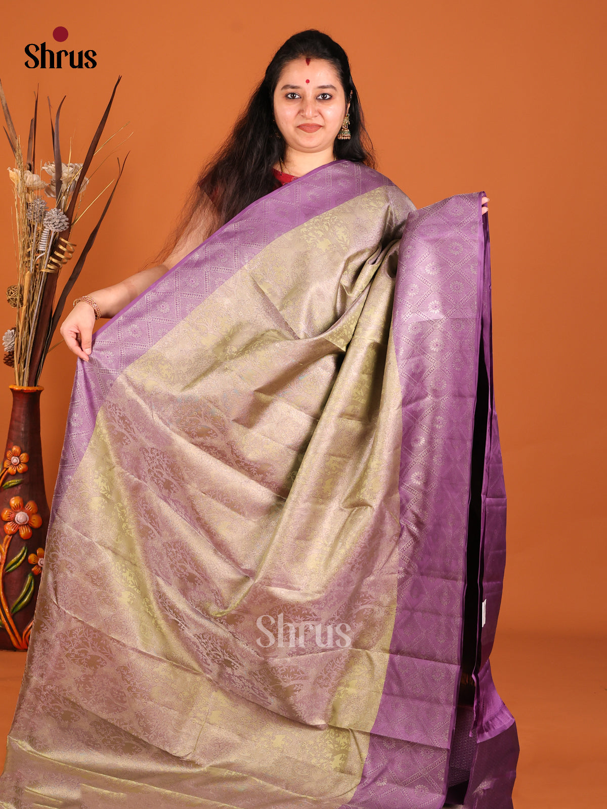 Unique Double Shaded Green Kanjivaram saree with Floral Brocade & Purple Border