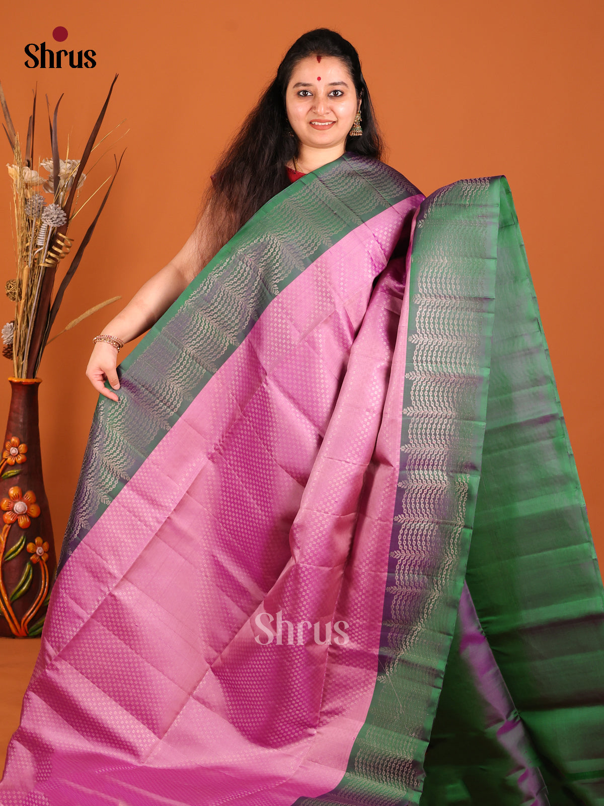 Lotus Pink Soft Silk Saree with intricately woven zari buttas & Green Brocade Border - Shop on Shrus.com