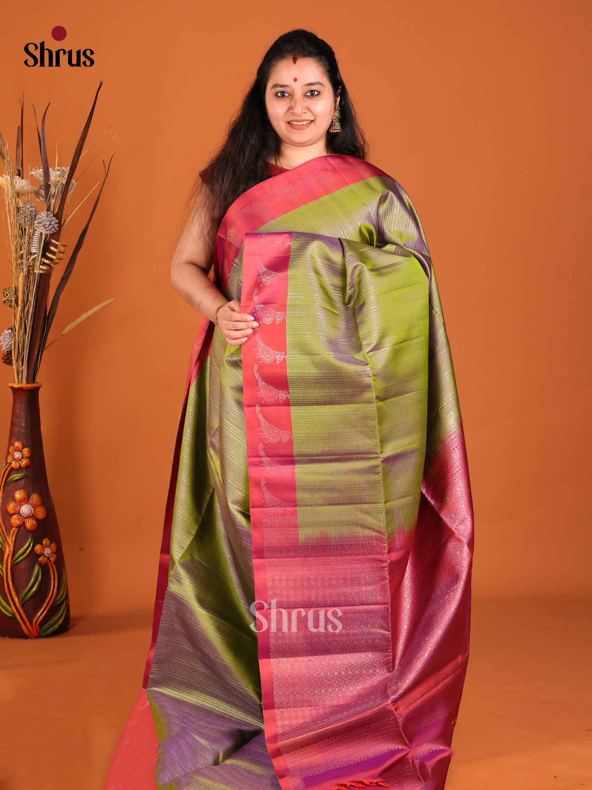 Majestic Green Soft Silk with Zari Stripes & Purple Border With parrot motifs
