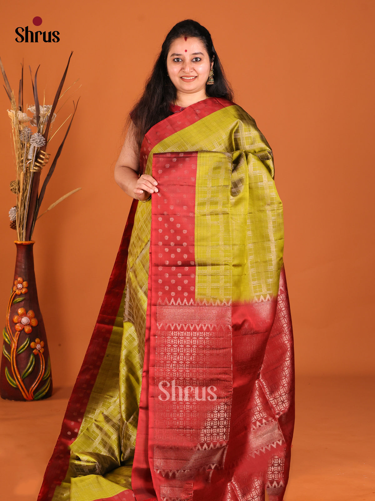 Graceful Mehandi Green Soft Silk Saree with zari checks & Maroon Border With Zari Buttas