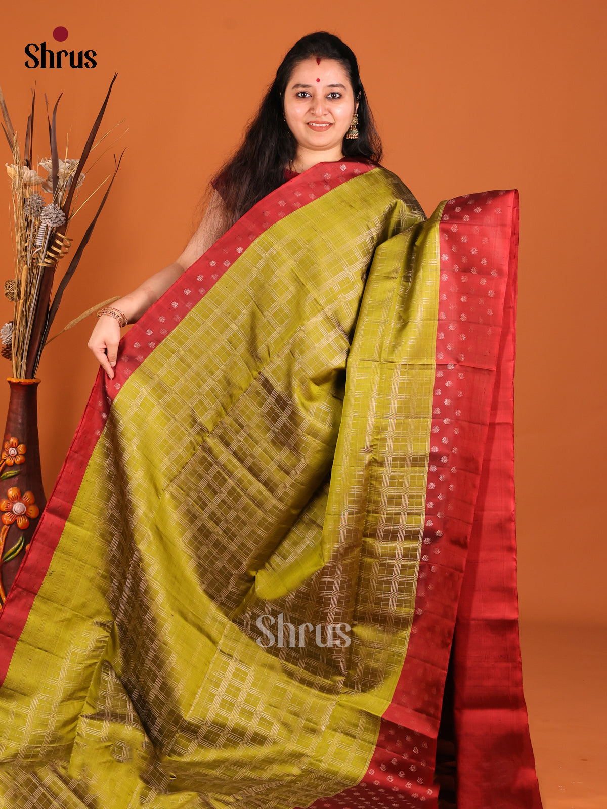 Graceful Mehandi Green Soft Silk Saree with zari checks & Maroon Border With Zari Buttas