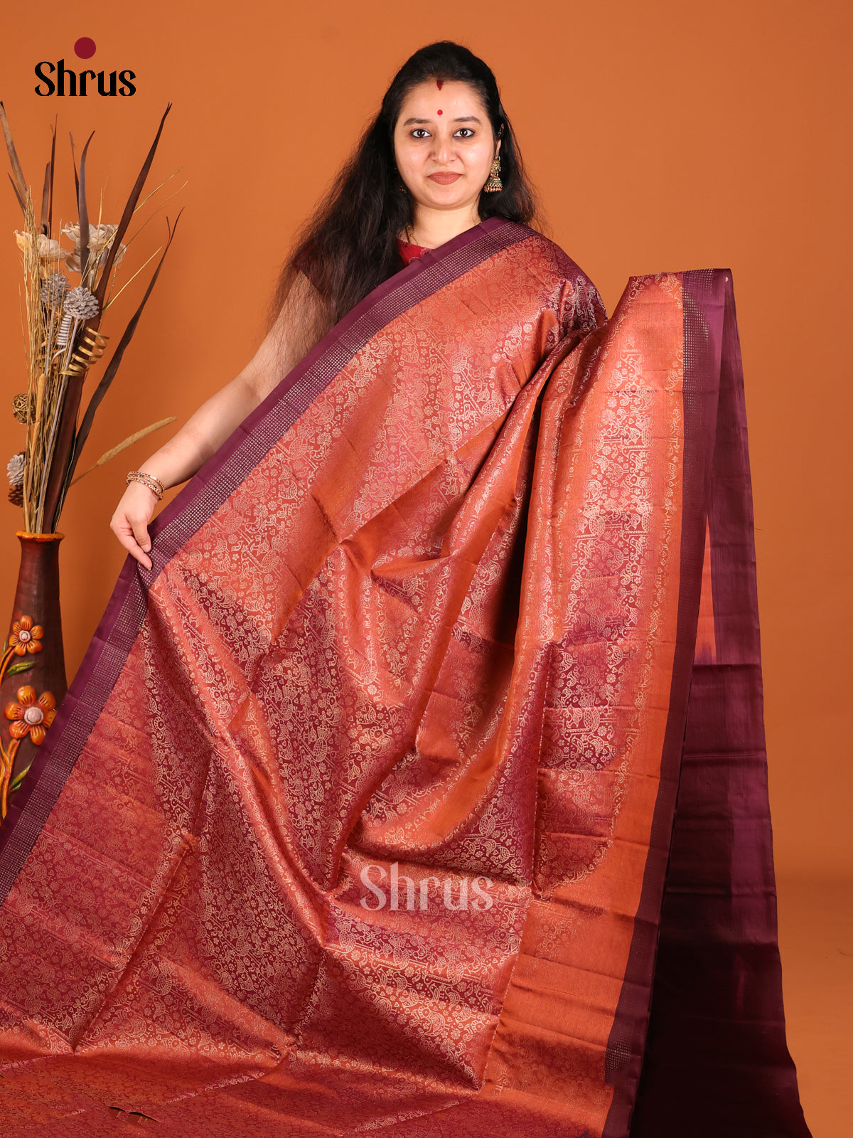 Chic Rust Orange Soft Silk Saree with zari floral nestling brocade & Maroon Border