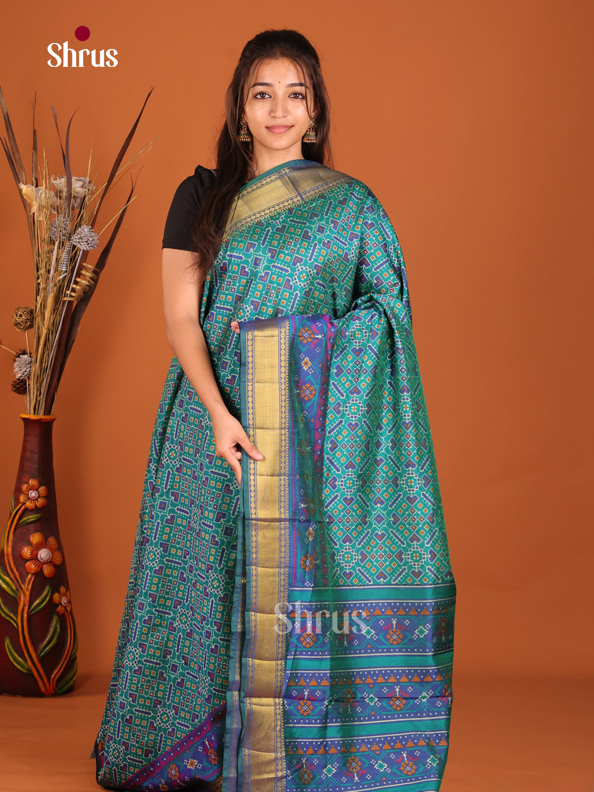 teal and blue with purple semi patola saree