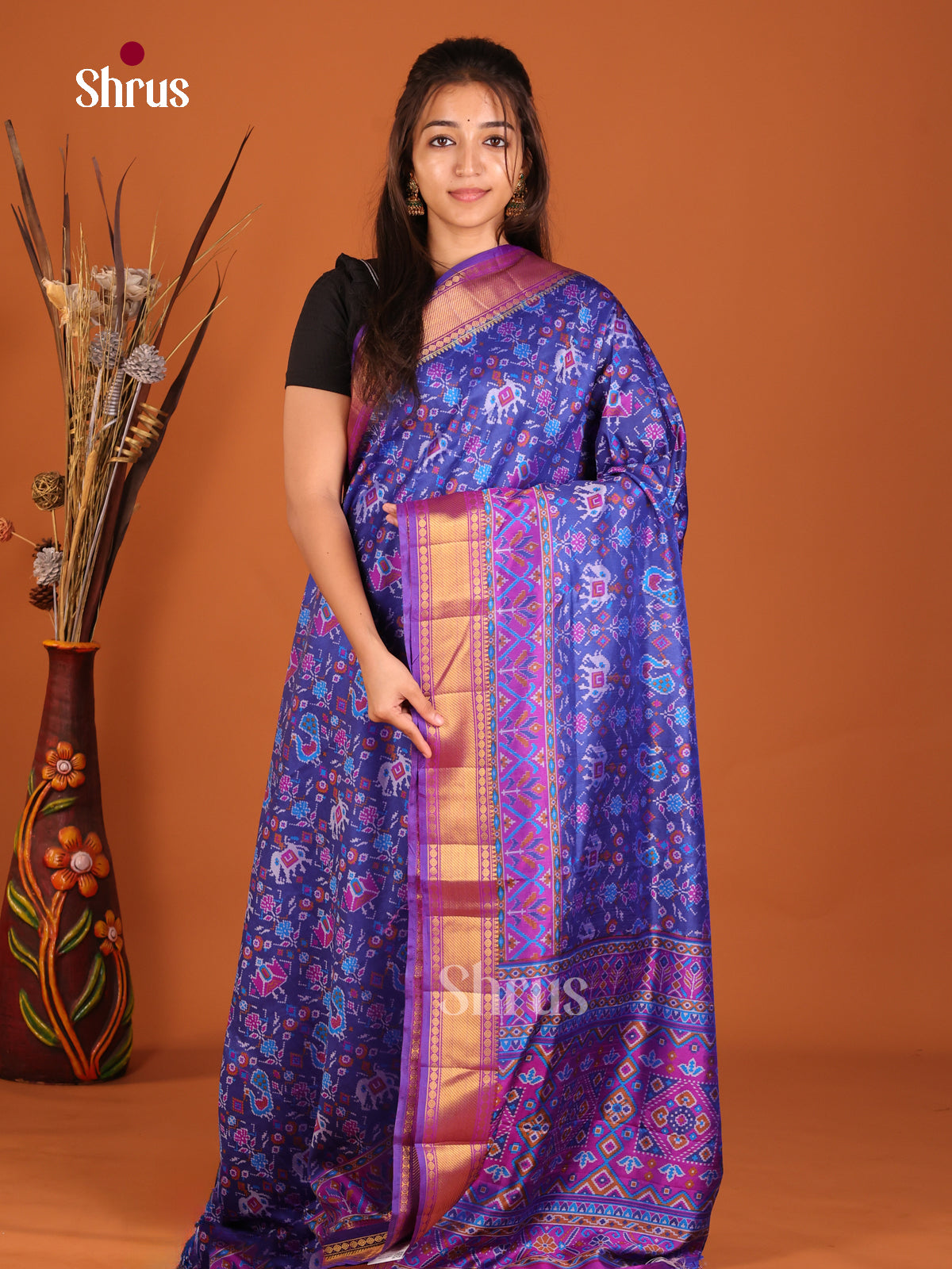 elegant blue and purple semi patola saree
