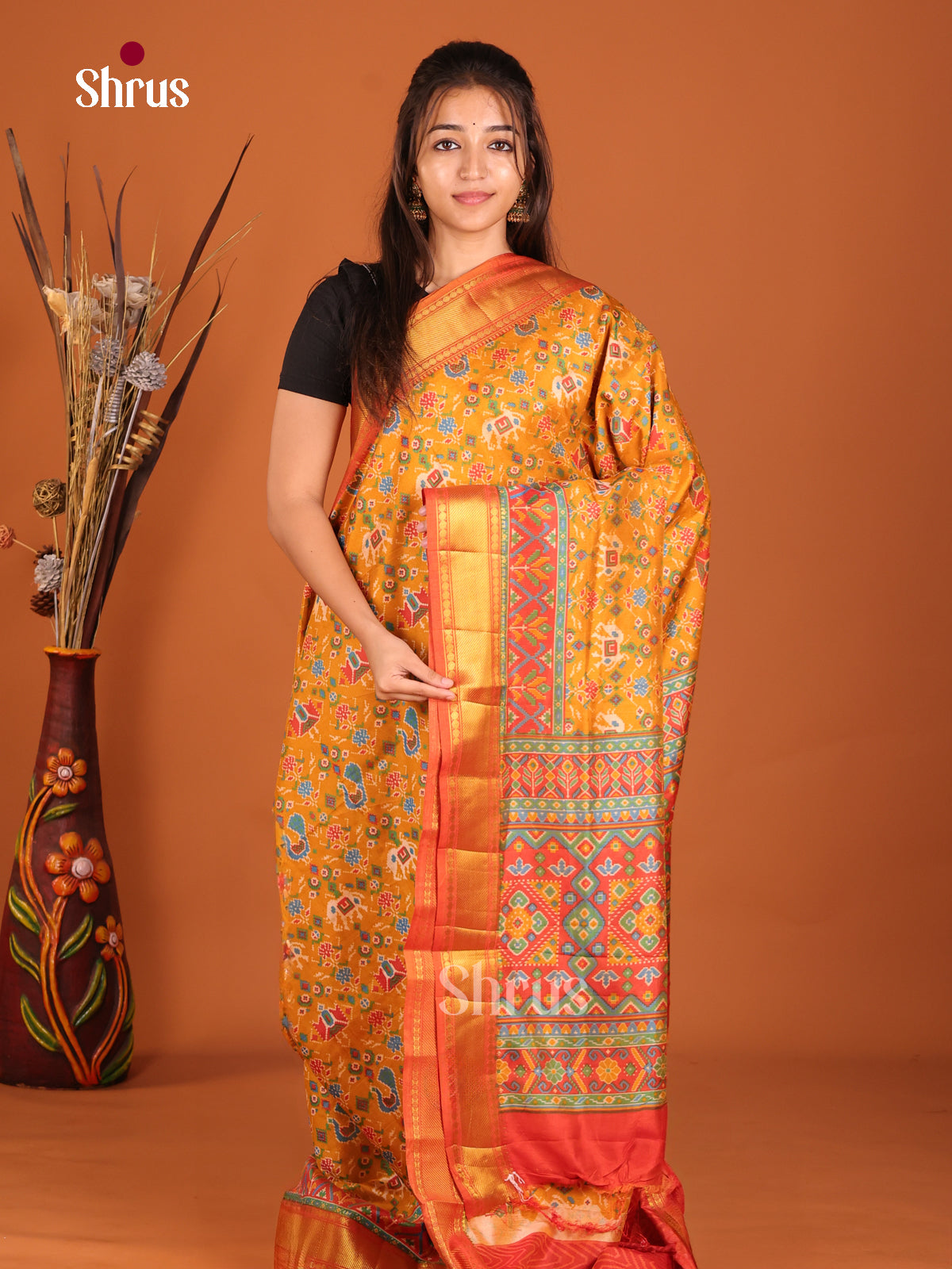 orange semi patola saree