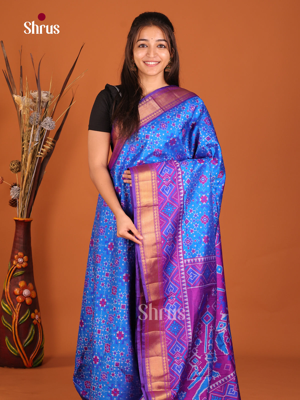 blue and purple semi patola saree