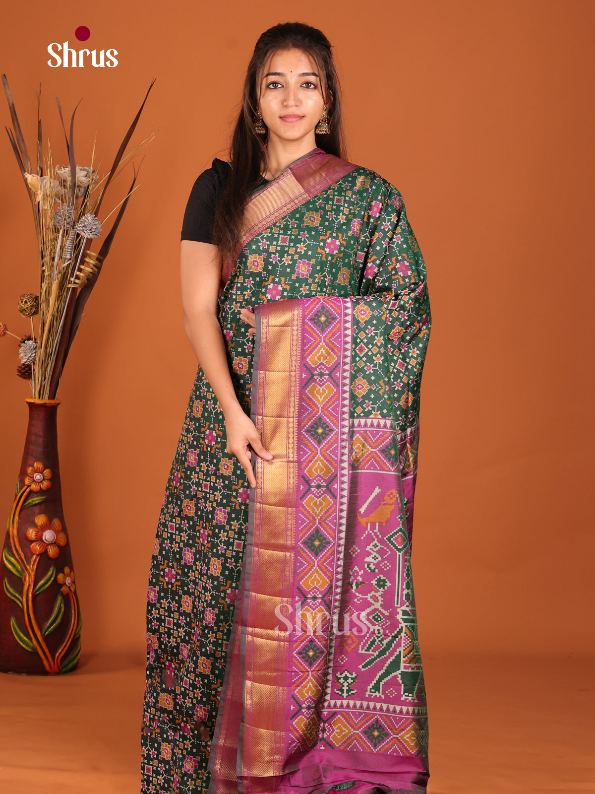 green with multi color semi patola saree