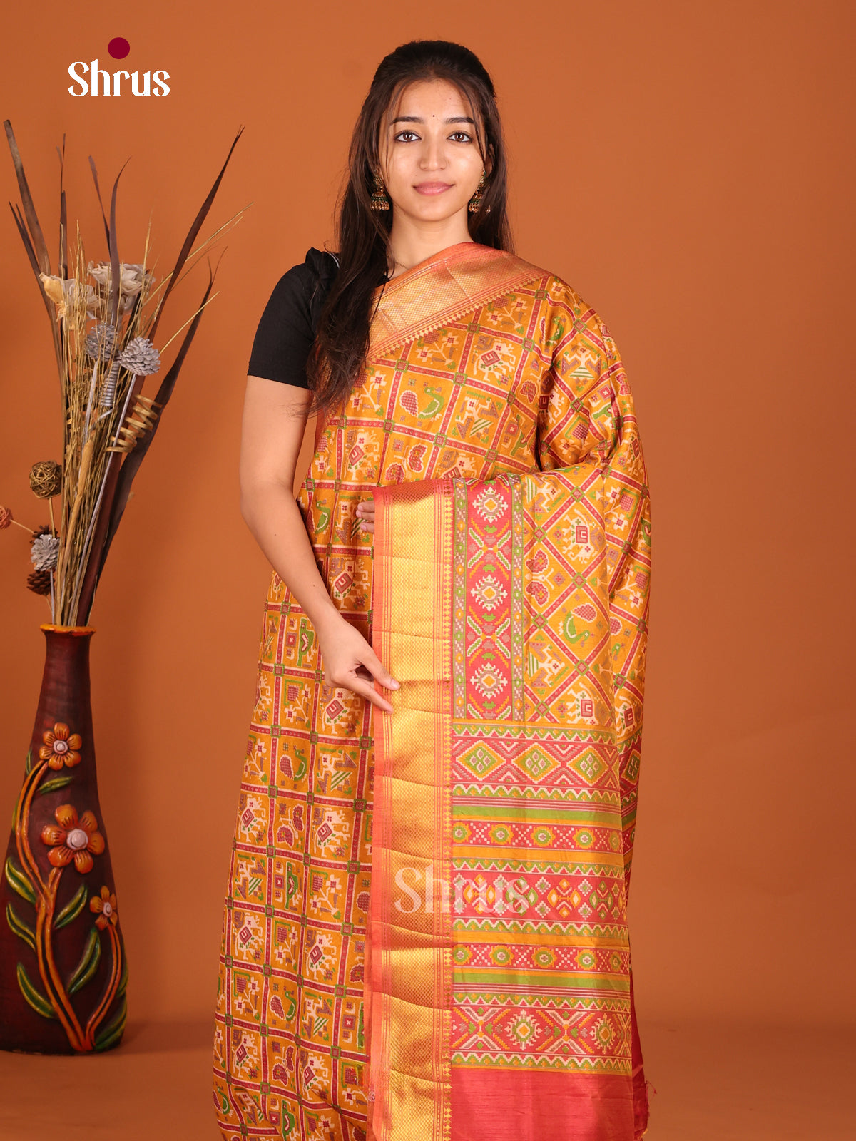 orange green brown semi patola saree