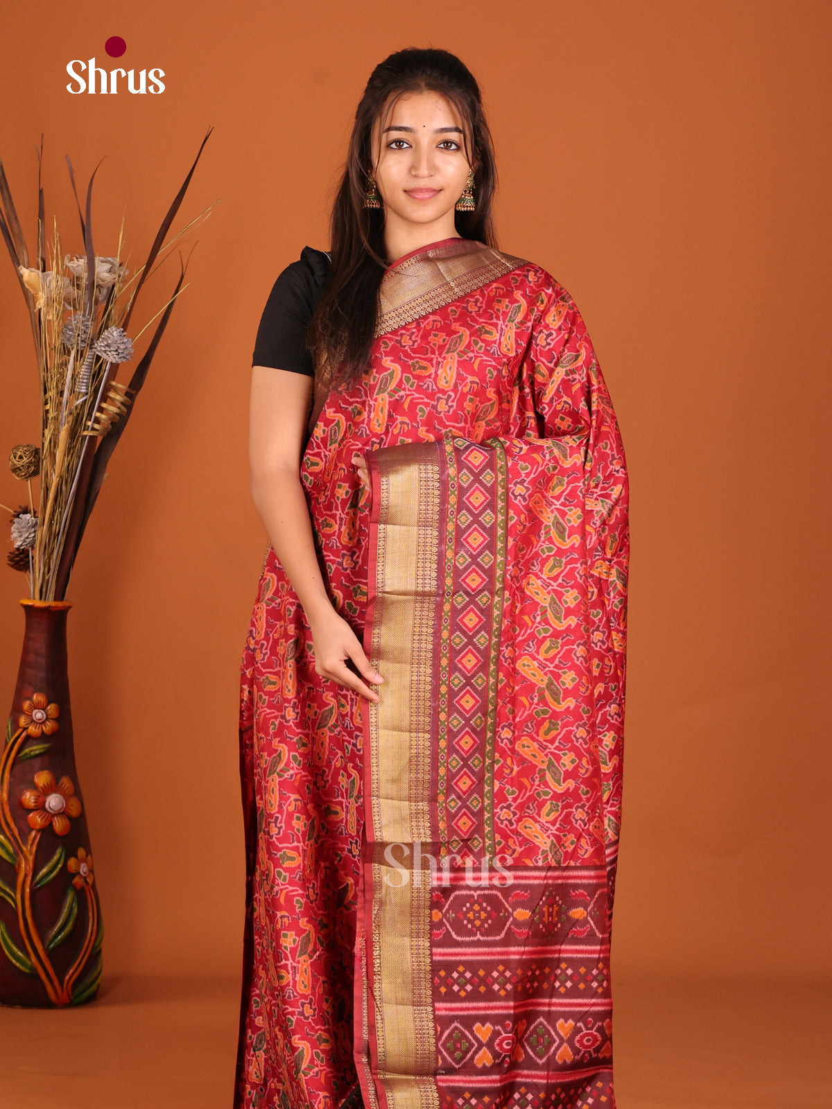 red with marron semi patola saree