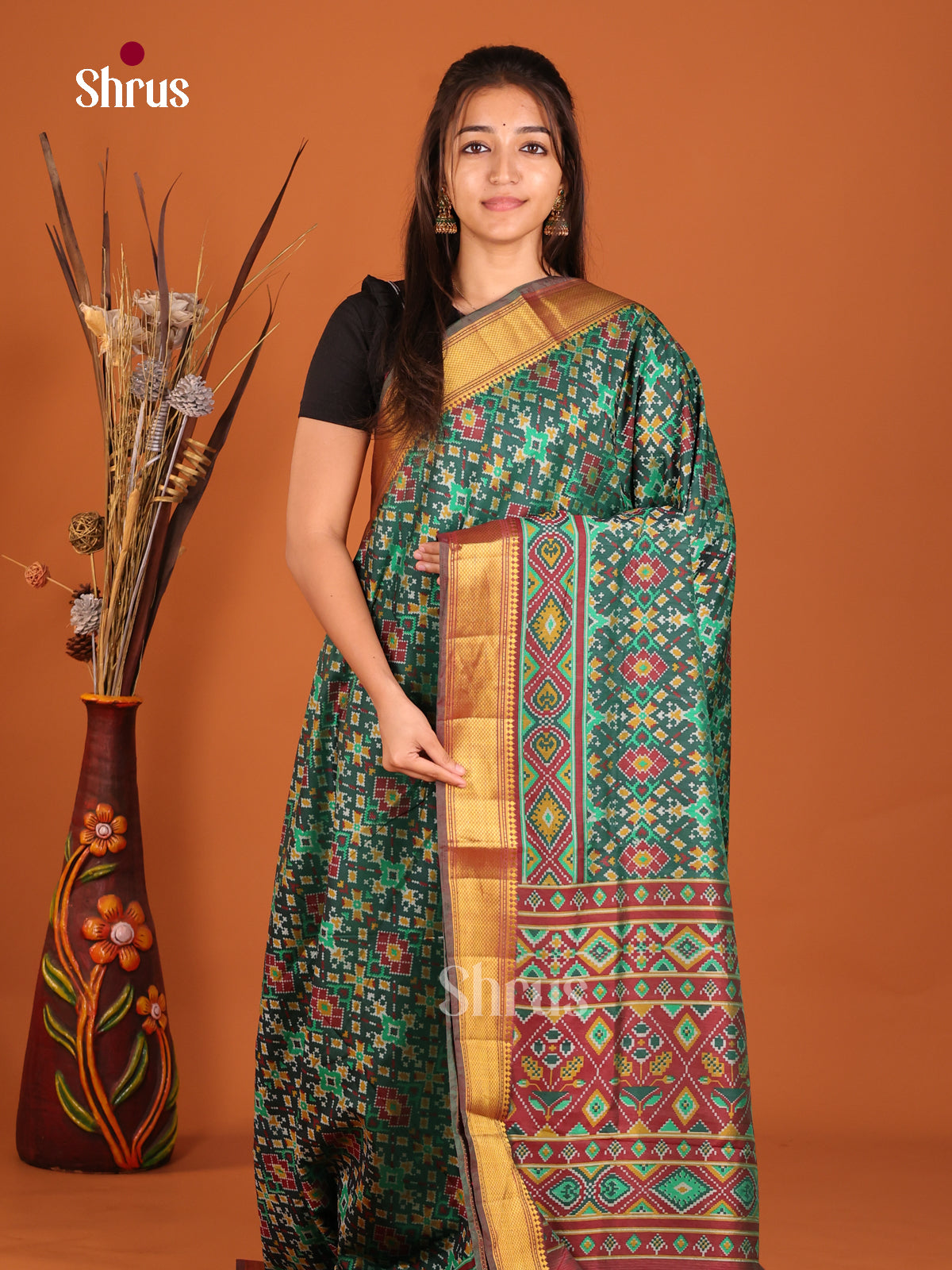green with multi color design semi patola saree