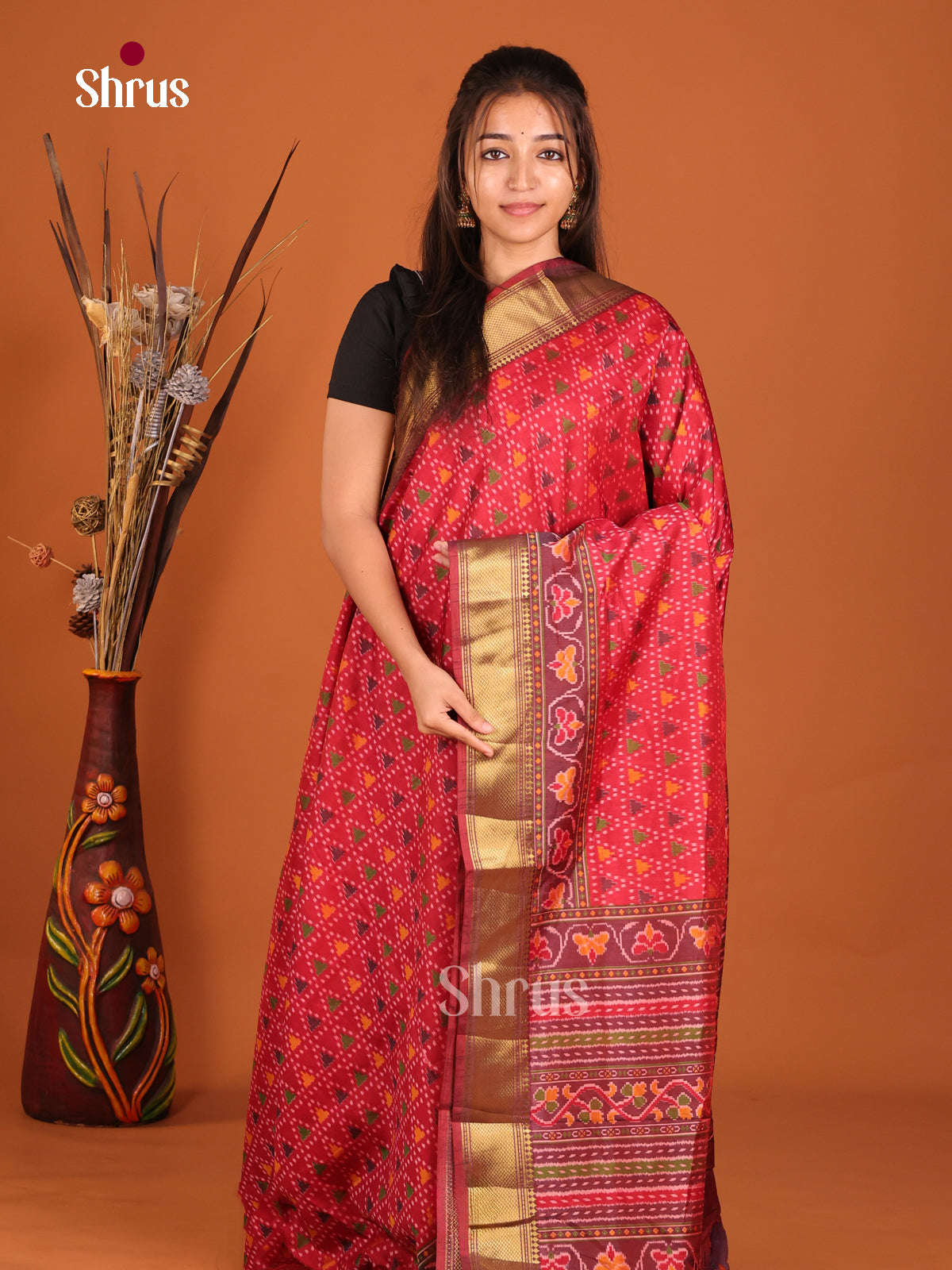 red with golden zari semi patola saree
