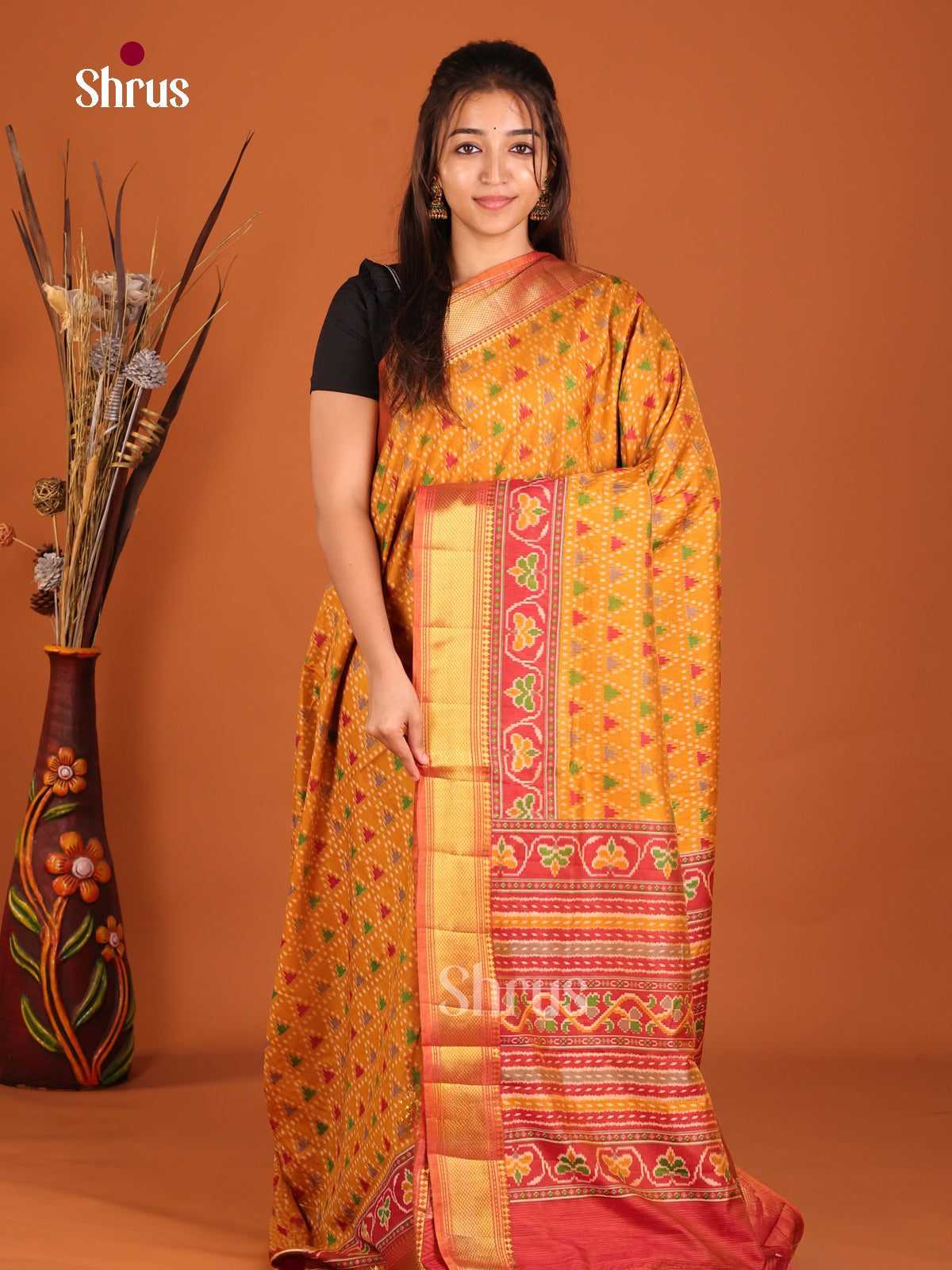 orange and red semi patola saree