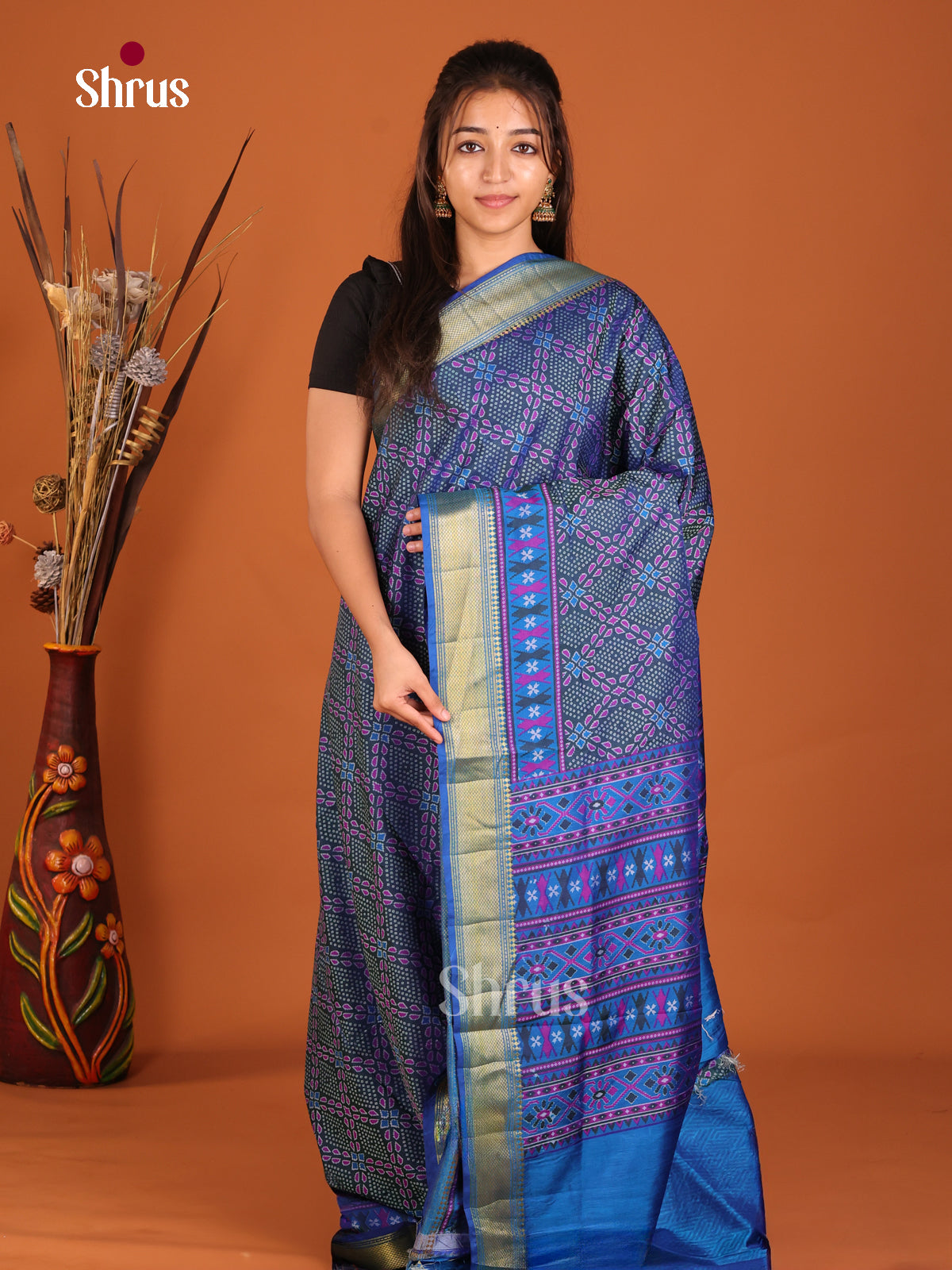 blue with purple designs semi patola saree