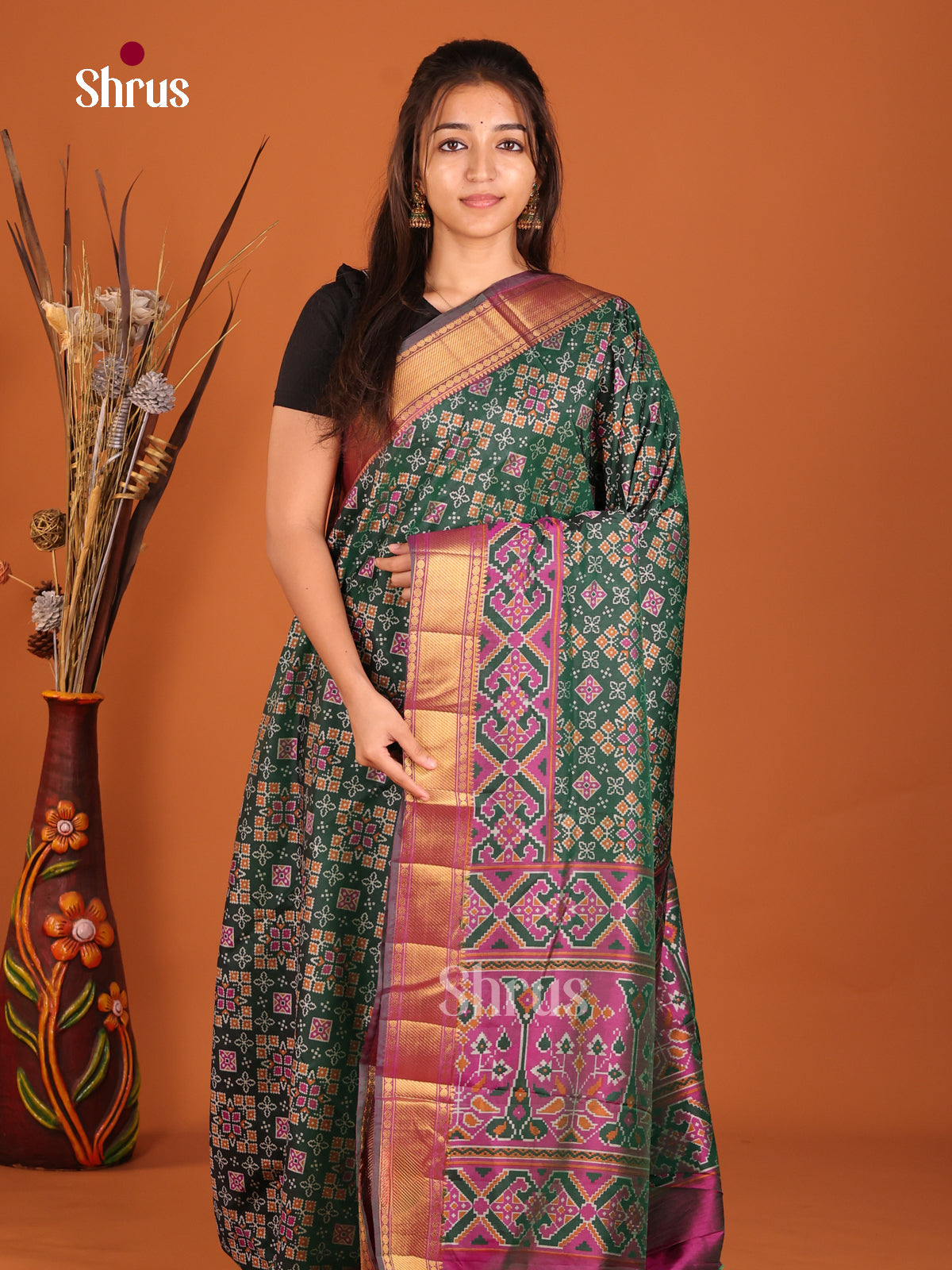 green and red semi patola saree