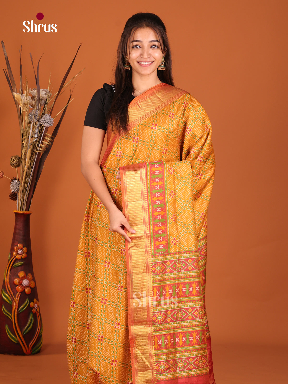 yellow and orange semi saree