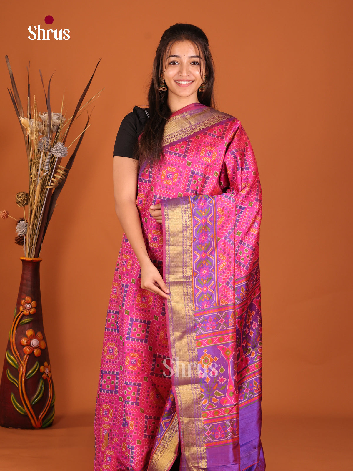 pink with purple semi patola saree
