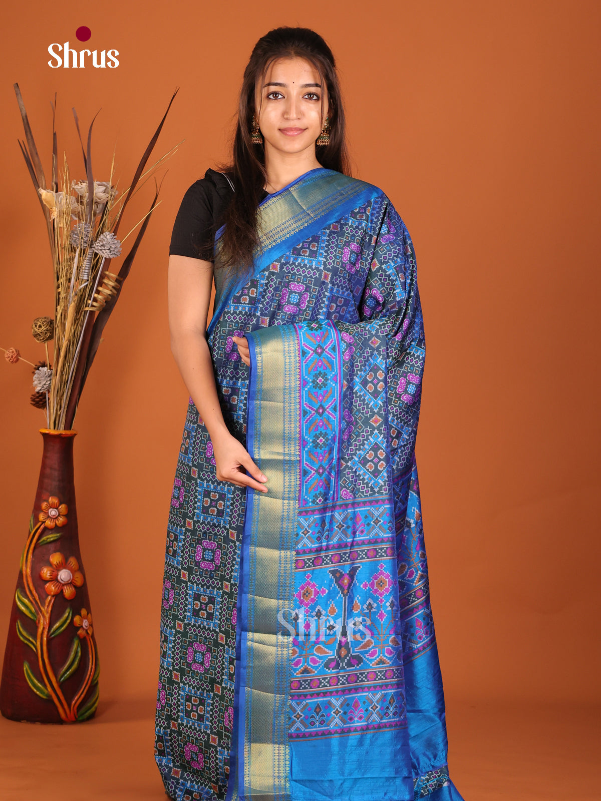 blue with purple and blue zari semi patola saree