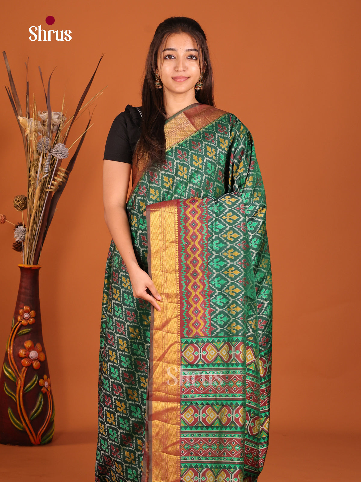 green red and yellow semi patola saree