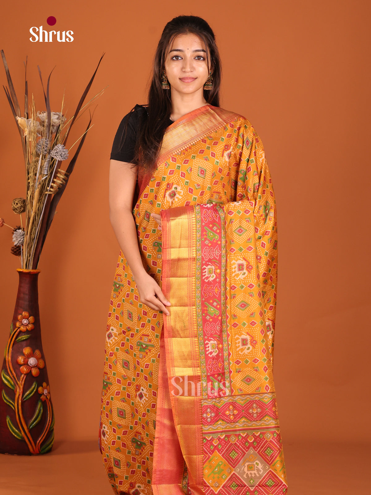 orange green red semi patola saree