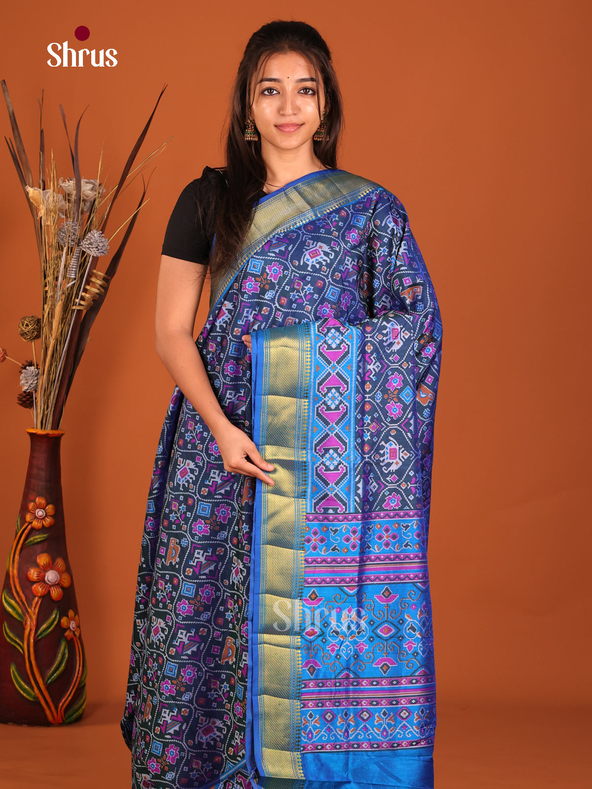 blue with pink and zari semi patola saree